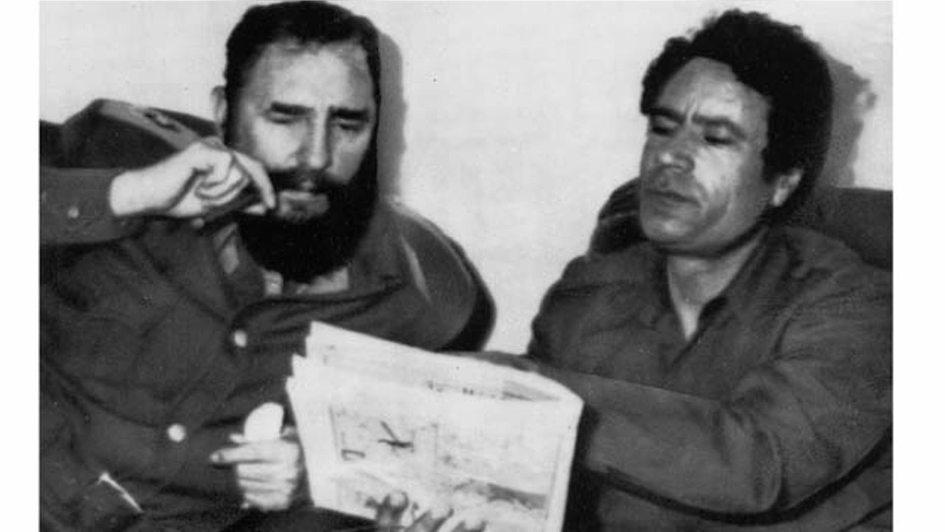 FILE - In this March 8, 1977 file photo Cuban leader Fidel Castro and Moammar Gadhafi meet in Tripoli, Libya. As rebels swarmed into Tripoli late Sunday, Aug. 21, 2011, and Gadhafi's son and one-time heir apparent Seif al-Islam was arrested, Gadhafi's rule was all but over, even though some loyalists continued to resist. (AP Photo, File)