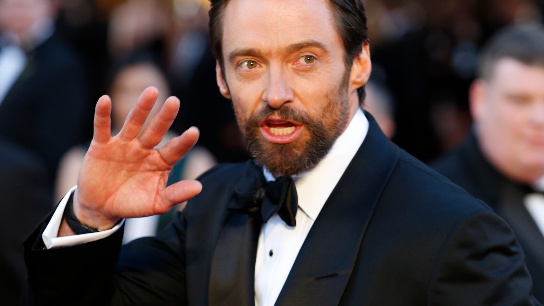 Australian born actor, Hugh Jackman, best actor nominee for his role in "Les Miserables" arrive at the 85th Academy Awards in Hollywood, California on Feb. 24, 2013.