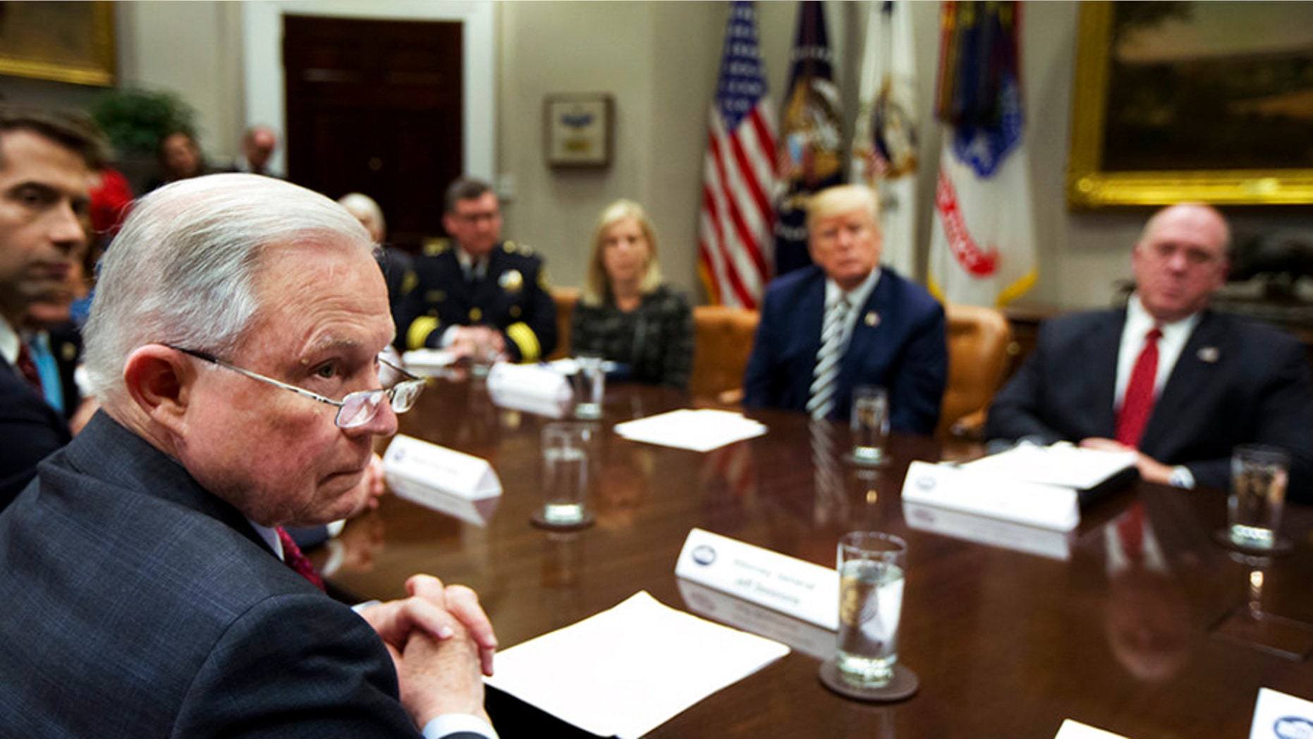 President Trump and Attorney General Jeff Sessions blasted so-called 'sanctuary cities' at a White House roundtable.