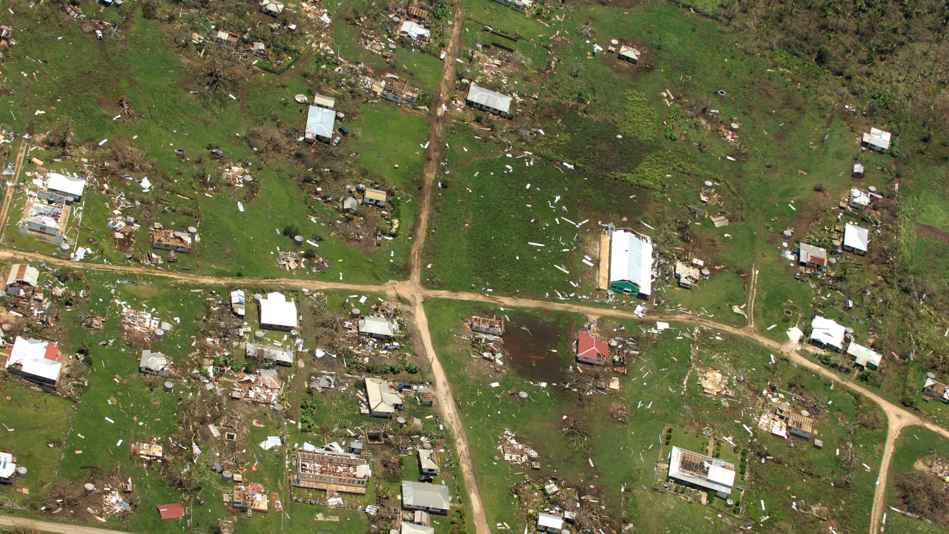 This aerial photo released by the Royal New Zealand Air Force, taken on Saturday, Jan. 11, 2014, shows the damage to Ha'apai island group, in Tonga, following Cyclone Ian. Tongan officials said about 300 to 400 families had their homes severely damaged or destroyed in the powerful storm that struck Saturday but they are relieved the death toll hasn’t risen beyond one. (AP Photo/Royal New Zealand Air Force) EDITORIAL USE ONLY