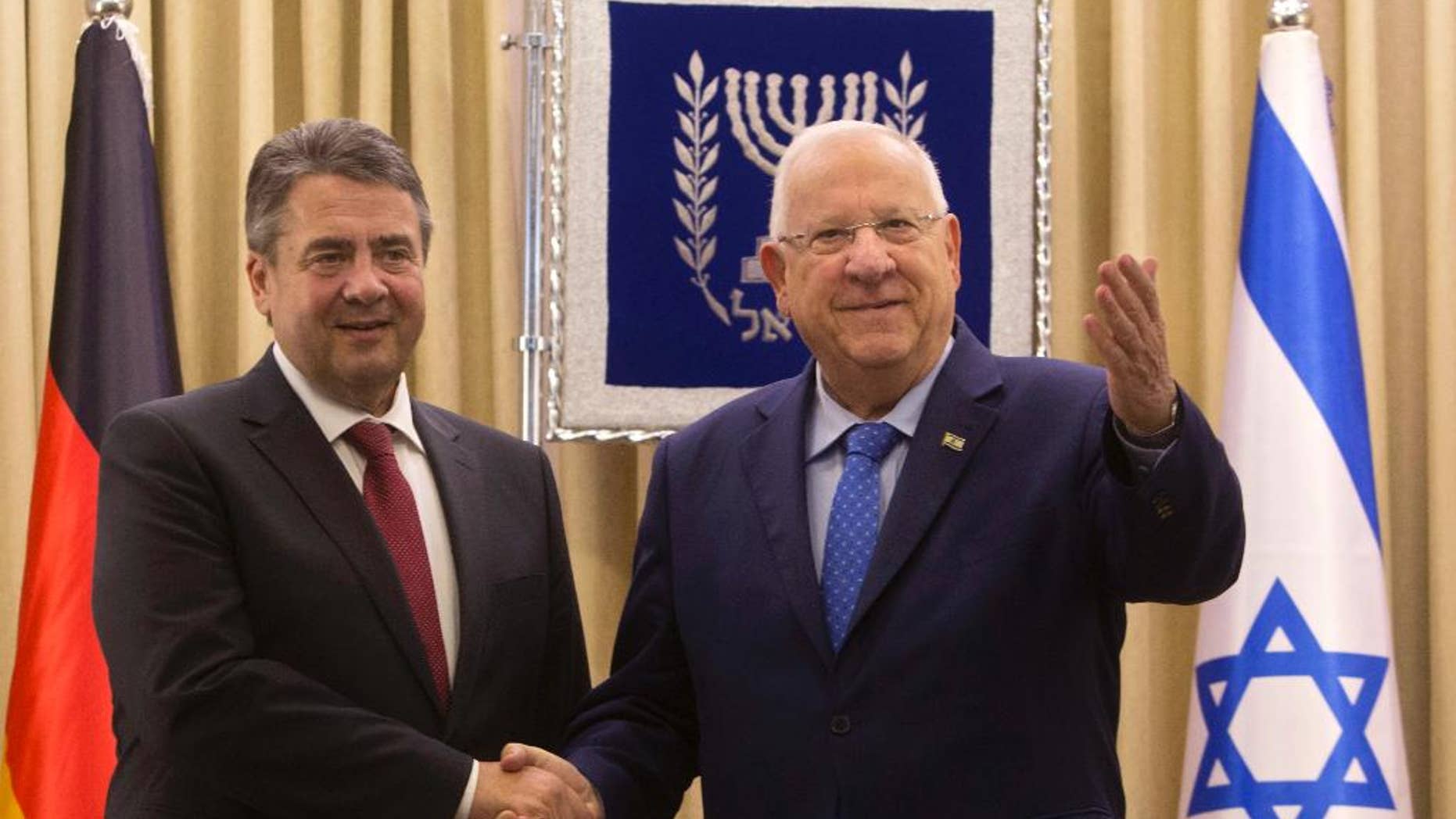 German Foreign Minister, Sigmar Gabriel, left, shakes hands with Israel's President, Reuven Rivlin during their meeting at the President's residence in Jerusalem, Tuesday, April 25, 2017. Gabriel said Tuesday it would be "regrettable" if Israeli Prime Minister Benjamin Netanyahu cancels their planned talks in Jerusalem because of his meeting with groups critical of Israel's actions in the West Bank, but downplayed the spat. (AP/Sebastian Scheiner)