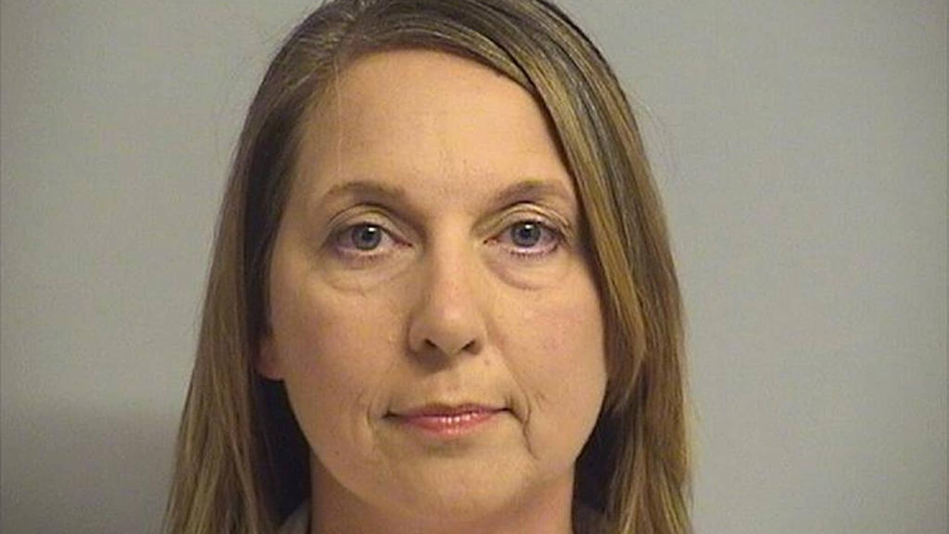 This photo provided by Tulsa County Inmate Information Center shows Tulsa police officer Betty Shelby. Tulsa County jail records show that Shelby turned herself in early Friday, Sept. 23, 2016, hours after prosecutors charged her with first-degree manslaughter in the death of Terence Crutcher. (Tulsa County Inmate Information Center via AP)