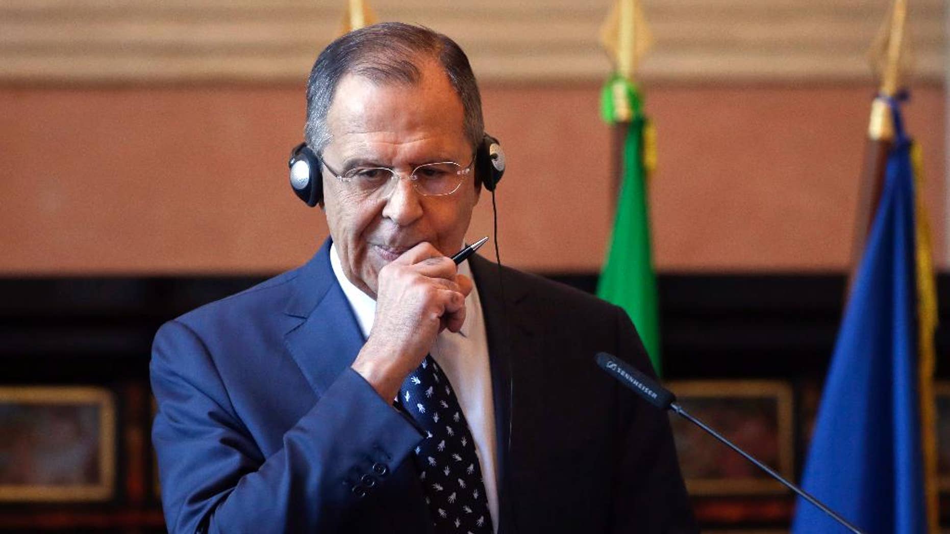 Russian Foreign Minister Sergey Lavrov meets the media during a news conference at the Mediterranean Dialogues Conference Forum, in Rome, Friday, Dec. 11, 2015. (AP Photo/Alessandra Tarantino)