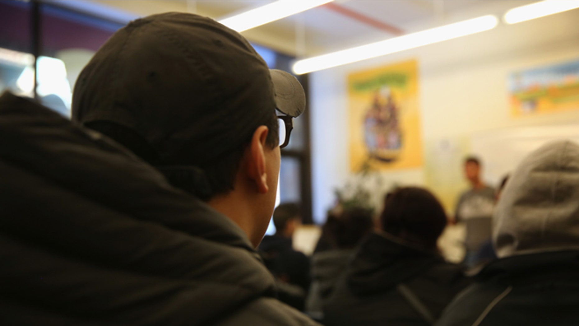 NEW YORK, NY - FEBRUARY 18: Immigrants attend a workshop for Deferred Action for Childhood Arrivals (DACA), on February 18, 2015 in New York City. The immigrant advocacy group Make the Road New York holds weekly workshops to help immigrants get legal status under DACA to work in the United States. An expansion of the national program, scheduled for this week, was frozen by a ruling from a Texas federal judge. The Obama Administration plans to appeal the ruling and, if sussessful, DACA would allow legalization of up to two million immigrants who entered the United States before they were age 16. (Photo by John Moore/Getty Images)