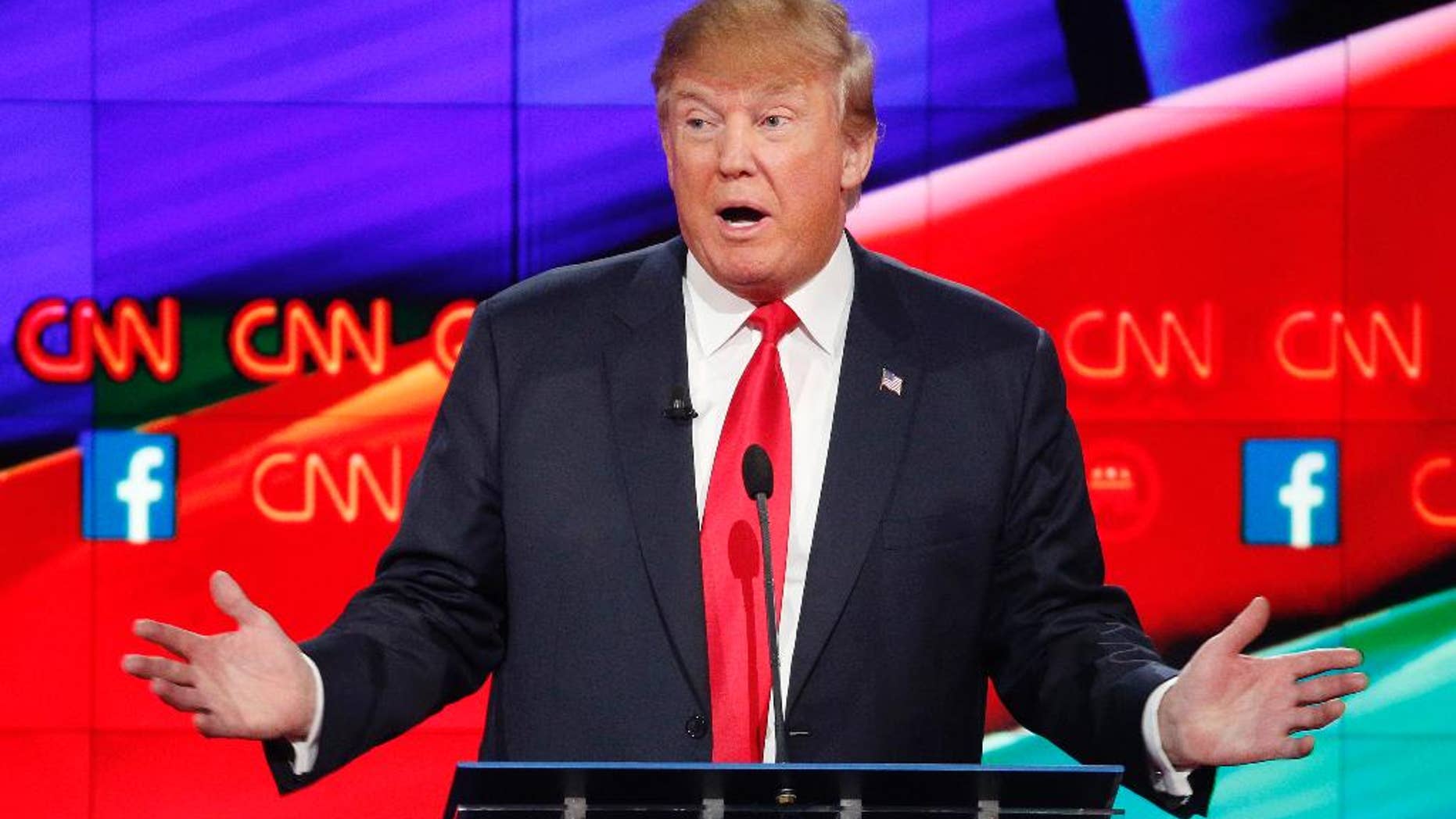 Donald Trump makes a point during the CNN Republican presidential debate at the Venetian Hotel & Casino on Tuesday, Dec. 15, 2015, in Las Vegas. (AP Photo/John Locher)