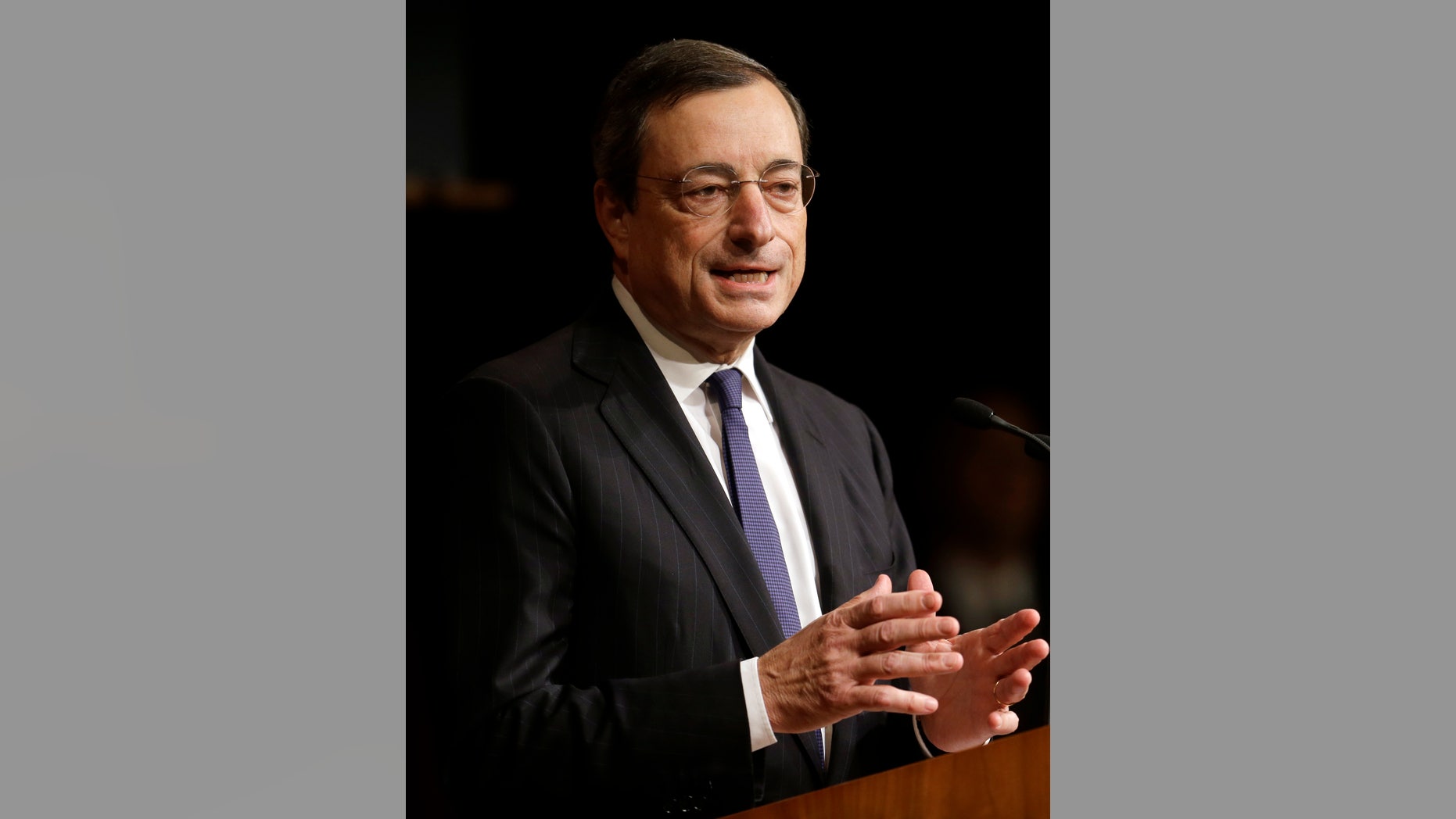 President of the European Central Bank Mario Draghi addresses an audience at the Harvard Kennedy School of Government, on the campus of Harvard University, in Cambridge, Mass., Wednesday, Oct. 9, 2013. (AP Photo/Steven Senne)