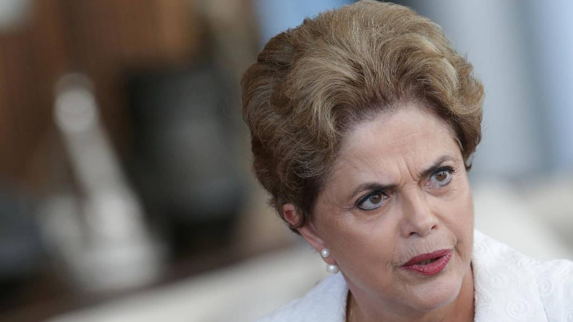FILE - In this May 13, 2016, file photo, suspended Brazilian President Dilma Rousseff speaks during a press conference with the international press corps, at the presidential residence Alvorada Palace in Brasilia, Brazil. Rousseff was quoted in an interview published on Sunday, May 29, 2016, that her impeachment is aimed at stopping the current corruption investigation against several politicians and businessmen. (AP Photo/Eraldo Peres, File)