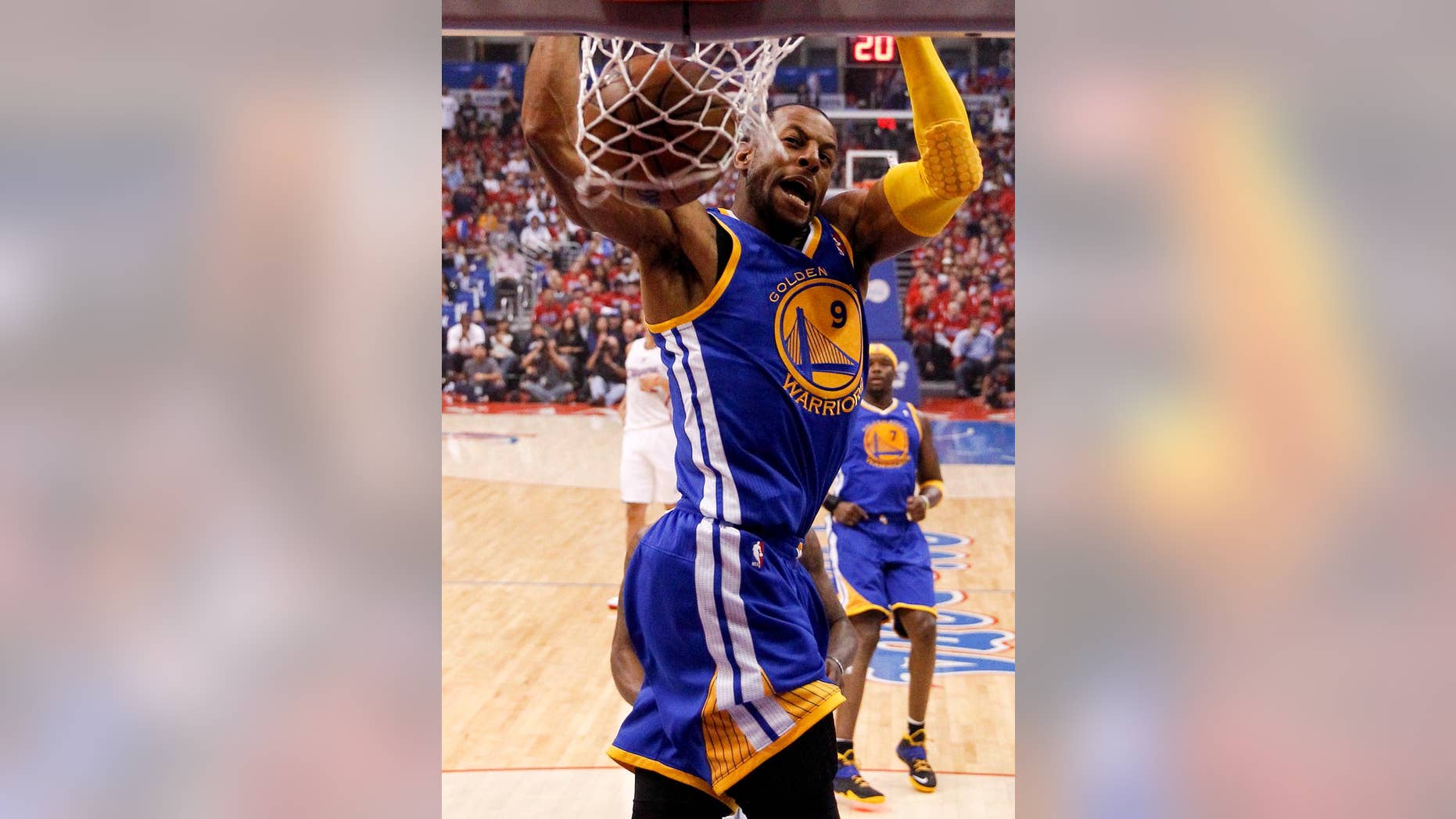Golden State Warriors forward Andre Iguodala dunks against the Los Angeles Clippers during the first half in Game 2 of an opening-round NBA basketball playoff series in Los Angeles, Monday, April 21, 2014. (AP Photo/Chris Carlson)
