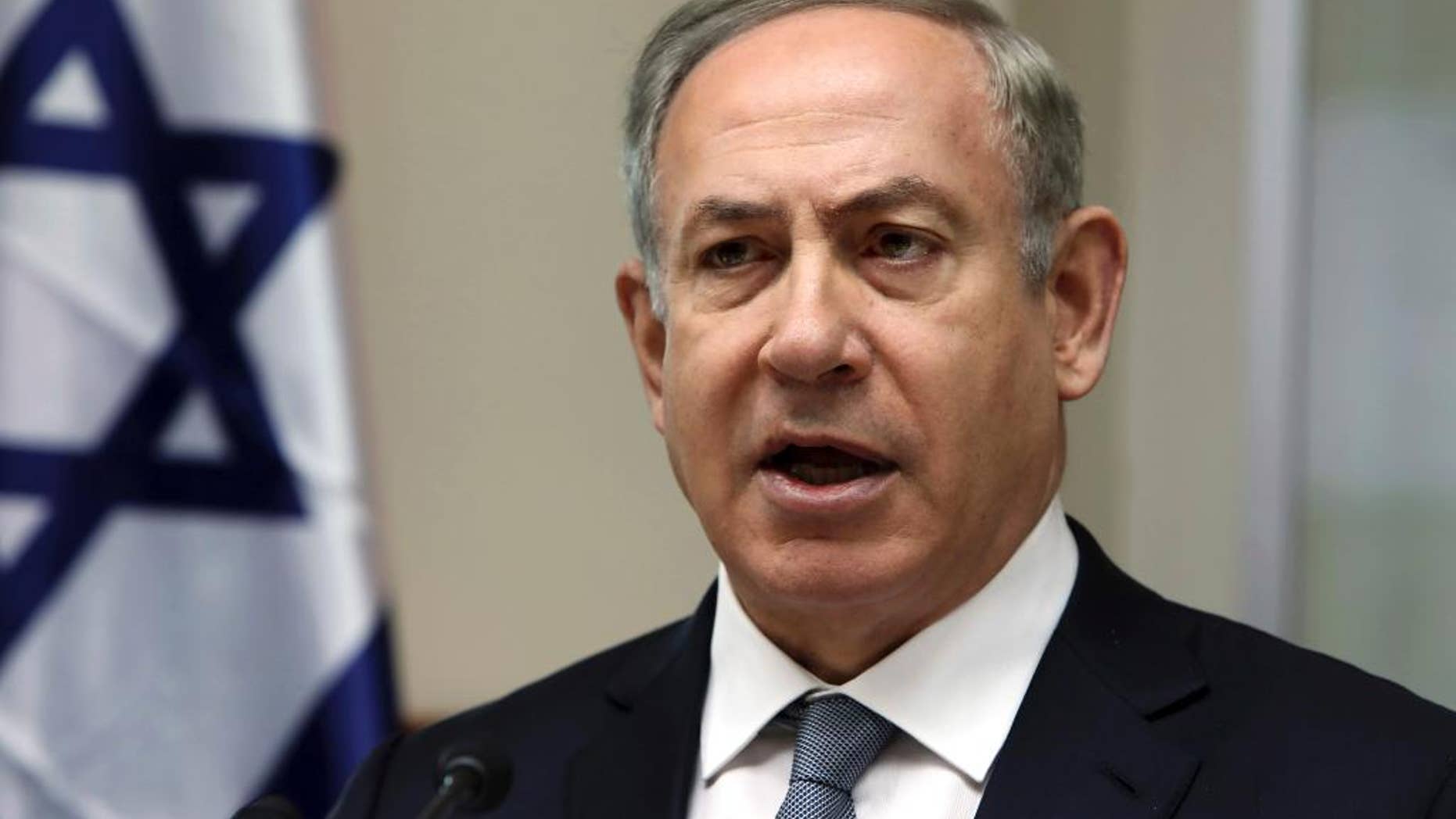 FILE - In this Sunday, Feb. 12, 2017 file photo, Israeli Prime Minister Benjamin Netanyahu chairs the weekly cabinet meeting in Jerusalem. As Netanyahu visits the White House, the Trump administration has suggested that peace between the Israelis and Palestinians may not come in the form of a two-state solution — a position that could represent a dramatic shift from 20 years of U.S. policy. Speaking to reporters ahead of President Donald Trump's meeting Wednesday with Netanyahu, a senior White House official said Tuesday, Feb. 14, 2017, that Trump is eager to begin facilitating a peace deal between the two sides and hoping to bring them together soon. (Gali Tibbon, Pool via AP, File)