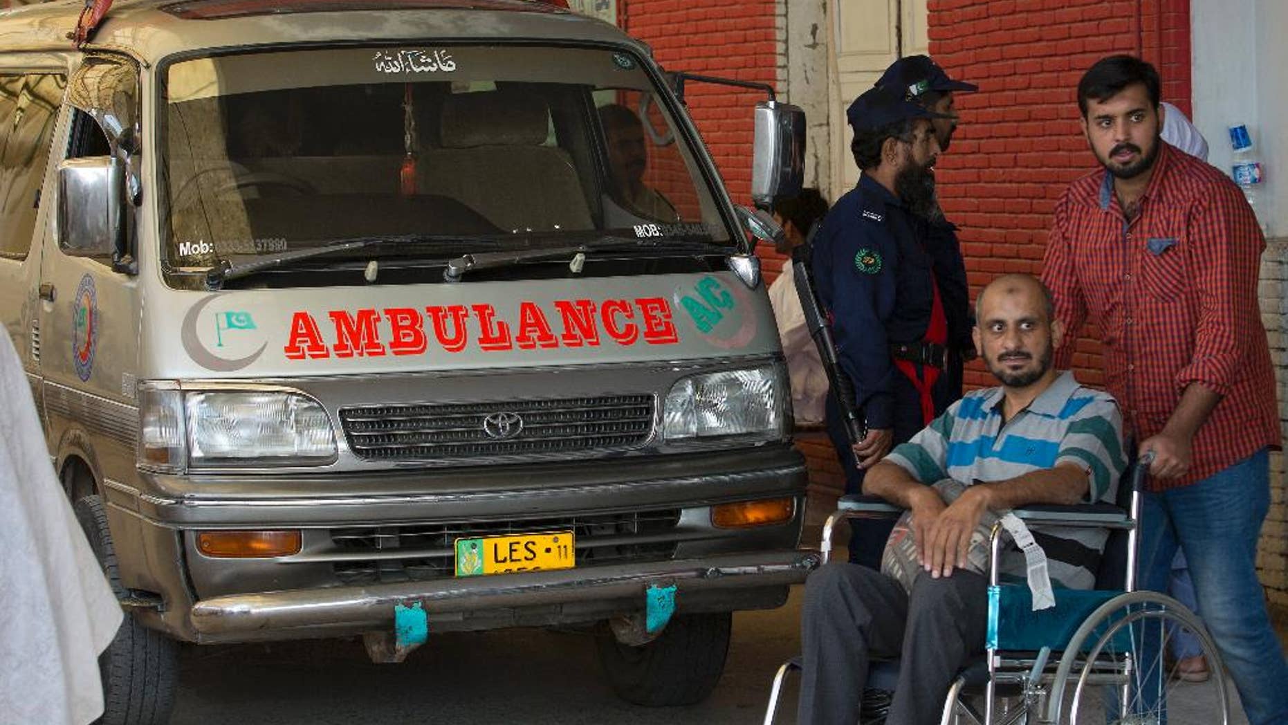 An ambulance that brought the body of a Spanish diplomat is parked at a clinic in Islamabad, Pakistan, Thursday, Oct. 13, 2016. Pakistani police say a Spanish diplomat has been found dead in his Islamabad home in what authorities suspect is a suicide. Police officer Iftikhar Chatha said Thursday that the 60-year-old man was found in his bedroom by a domestic servant. (AP Photo/B.K. Bangash)
