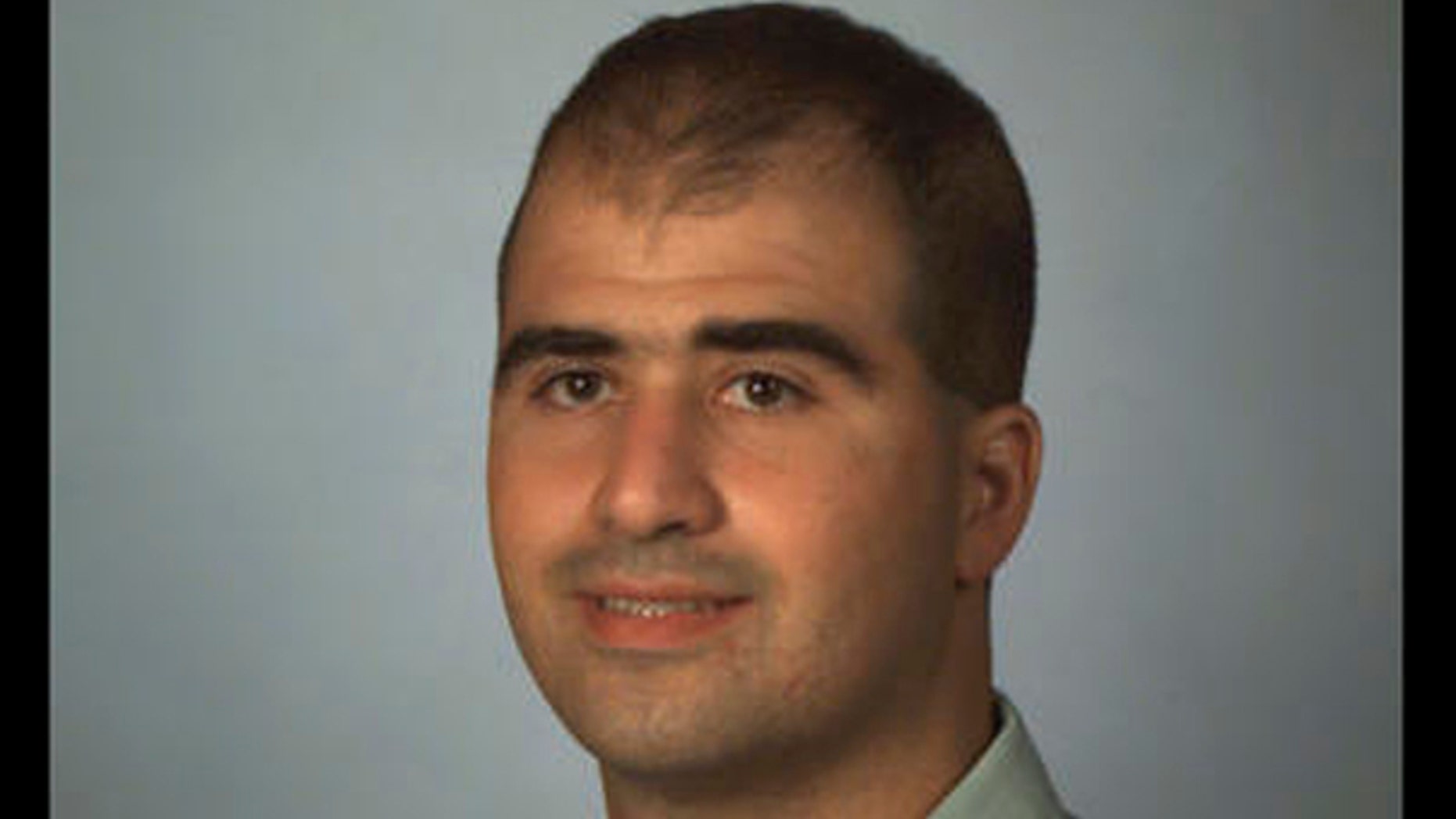2000 file photo of Uniformed Services University of the Health Sciences medical student Nidal Malik Hasan. (AP Photo)