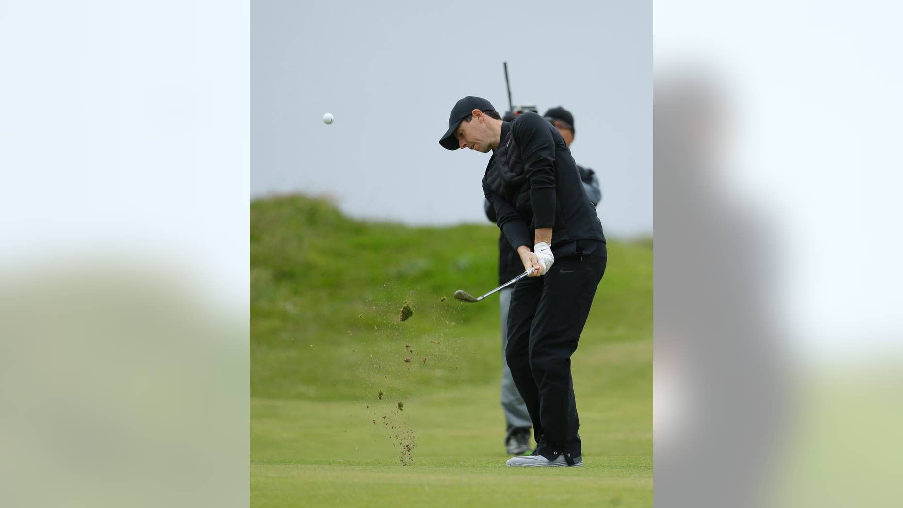Rory McIlroy of Northern Ireland hits a shot from the 3rd fairway during the third round of the British Open Golf Championship at the Royal Troon Golf Club in Troon, Scotland, Saturday, July 16, 2016. (AP Photo/Matt Dunham)