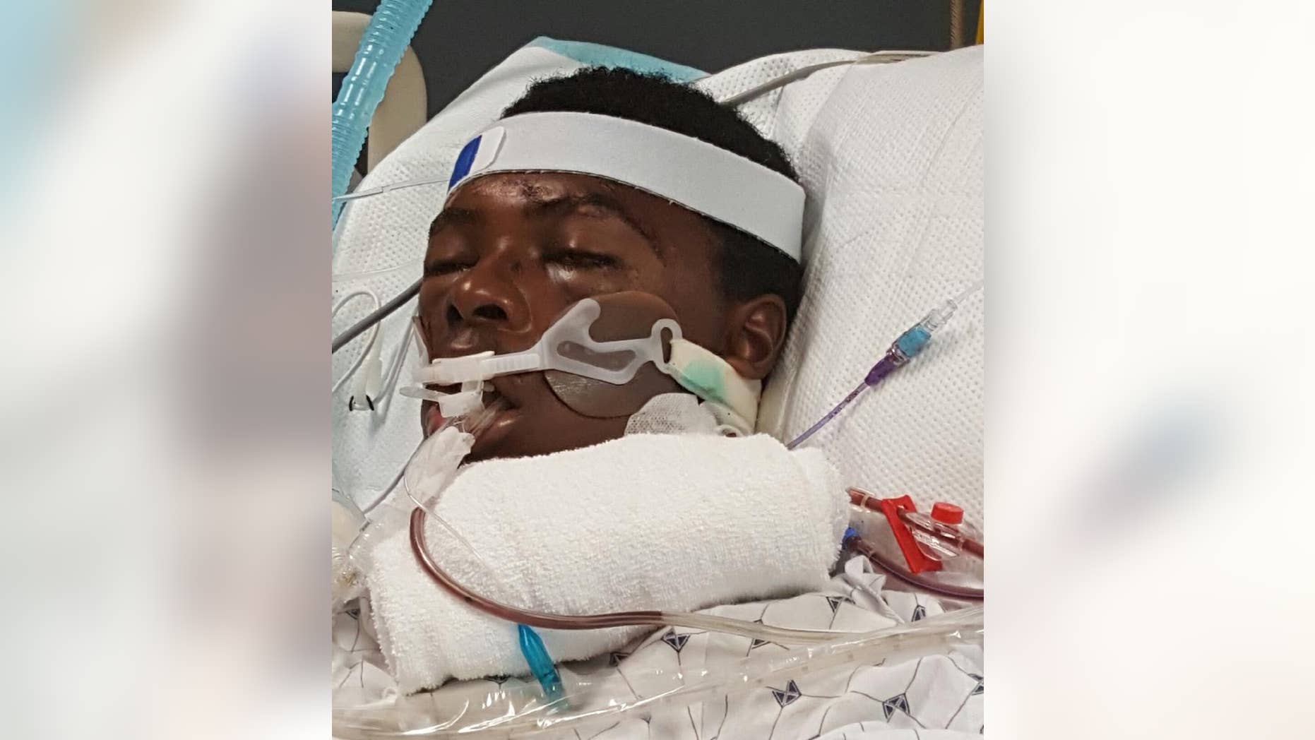 FILE - This photo provided by Prinice Thomas shows his nephew Tawon Boyd in the hospital after he was punched and held to the ground by Baltimore County police officers after a confrontation outside his home on Sunday, Sept. 18, 2016. The Maryland medical examiner's office said Boyd's death after a violent struggle with police was accidental and likely caused by drug use. Boyd's family attorney, A. Dwight Pettit said he'll have an independent expert review the autopsy and hospital records. (Prinice Thomas via AP, File)