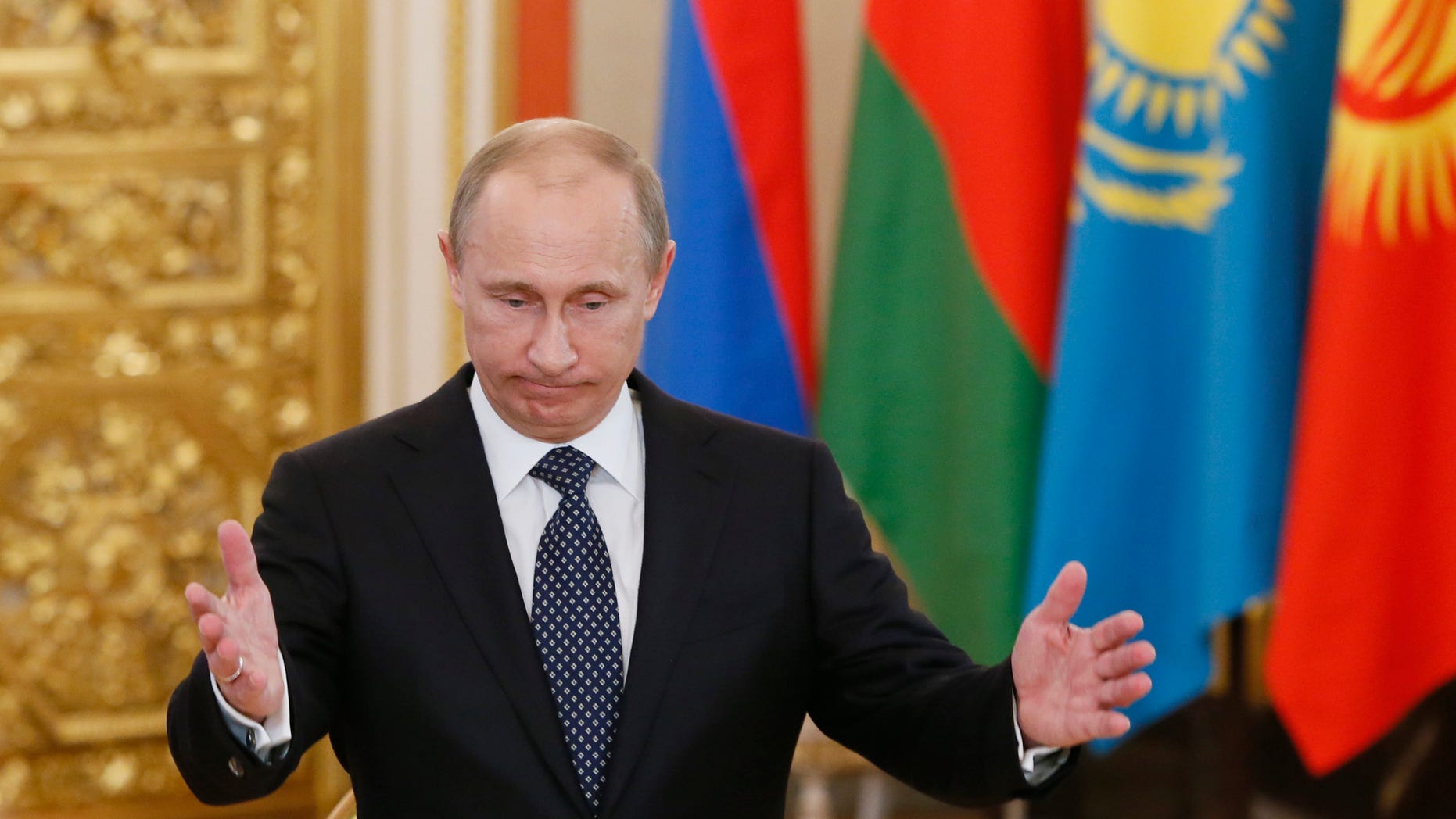 Russia's President Vladimir Putin welcomes the leaders of member countries of the Collective Security Treaty Organization (CSTO) in Moscow, Wednesday, Dec. 19, 2012. (AP Photo/Yuri Kochetkov, Pool)