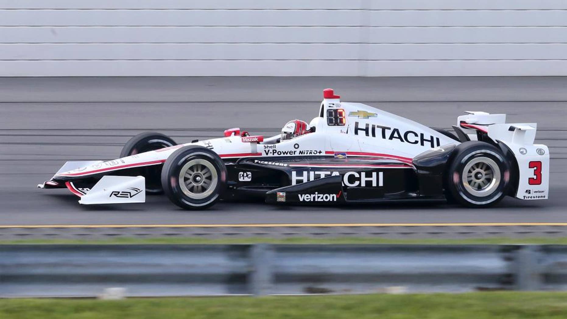 Takuma Sato, of Japan, (14) drives during qualifying for Sunday's Pocono IndyCar 500 auto race Saturday, Aug. 20, 2016, in Long Pond, Pa. (AP Photo/Mel Evans)