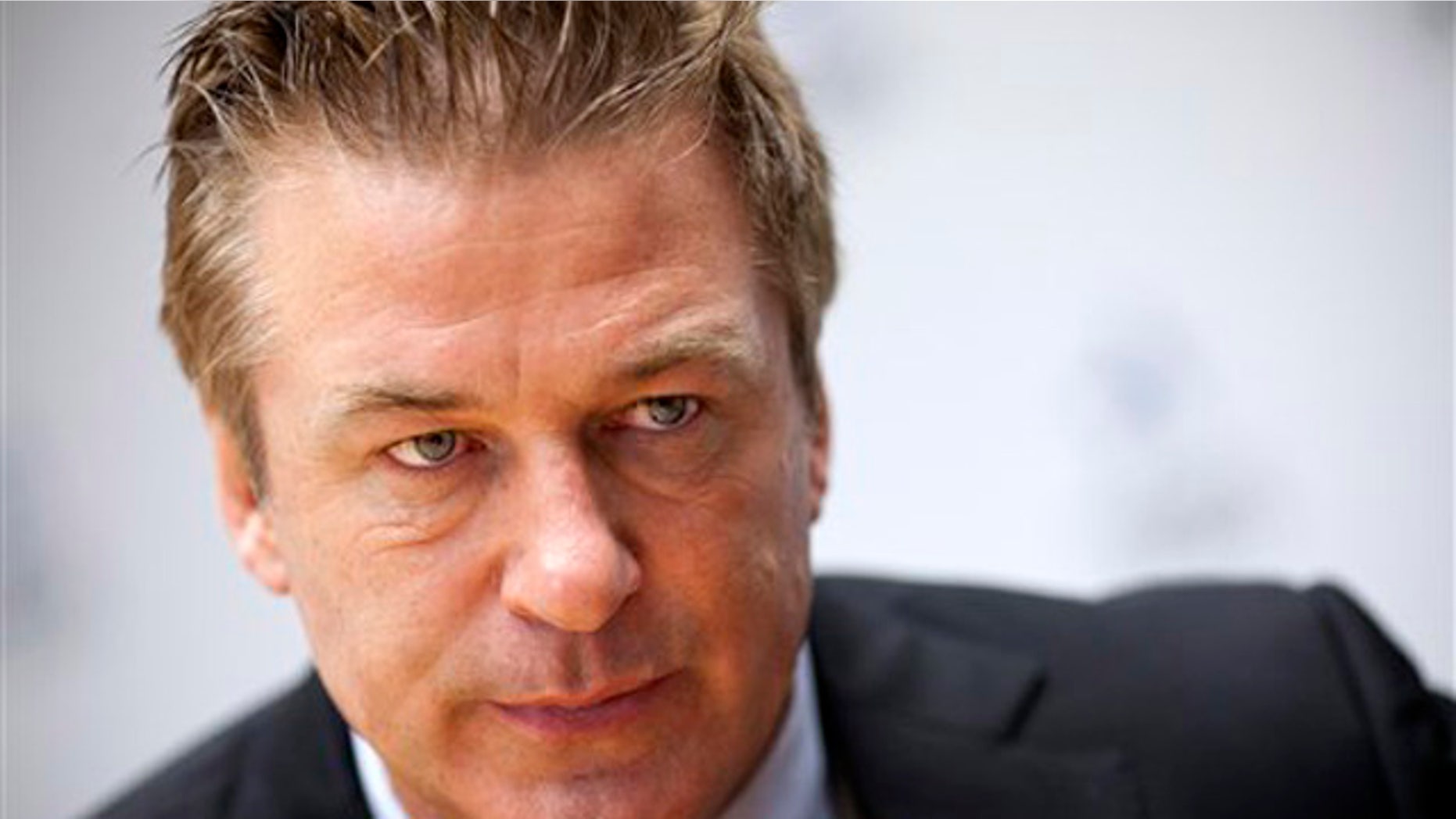 Alec Baldwin gestures during an interview with The Associated Press in Washington, Monday, April 16, 2012, Alec Baldwin is going to Congress to ask for sustained federal funding for arts programs amid the ever tight budget climate. (AP Photo/J. Scott Applewhite)