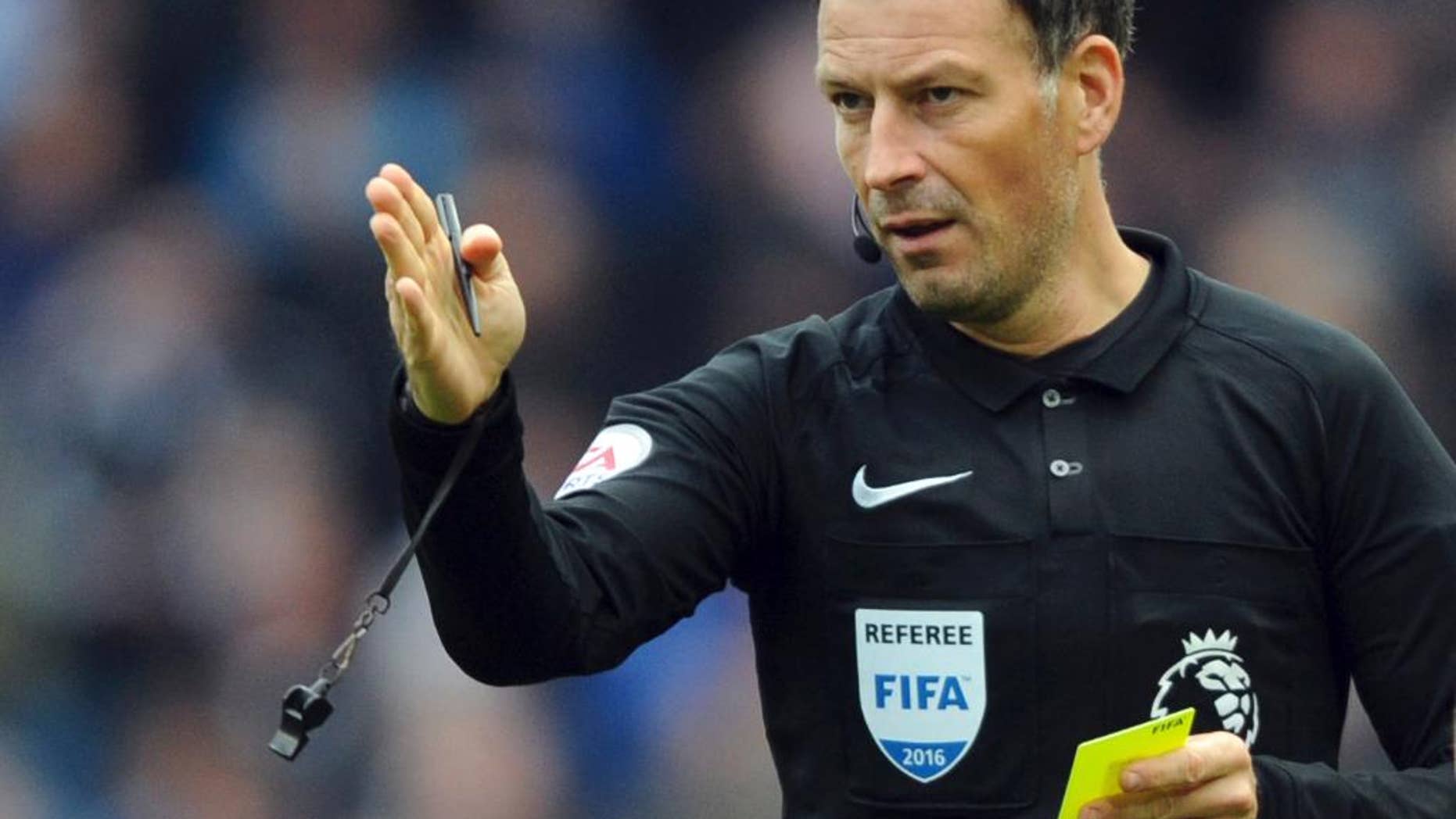 FILE - This is a Sunday, Oct. 23, 2016 file photo of English referee Mark Clattenburg during the English Premier League soccer match between Manchester City and Southampton at the Etihad Stadium in Manchester, England. In the hours and days after blowing the final whistle, Mark Clattenburg endures hidden anguish as the decisions made during 90 minutes of refereeing whirl through his mind.(AP Photo/Rui Vieira, File)