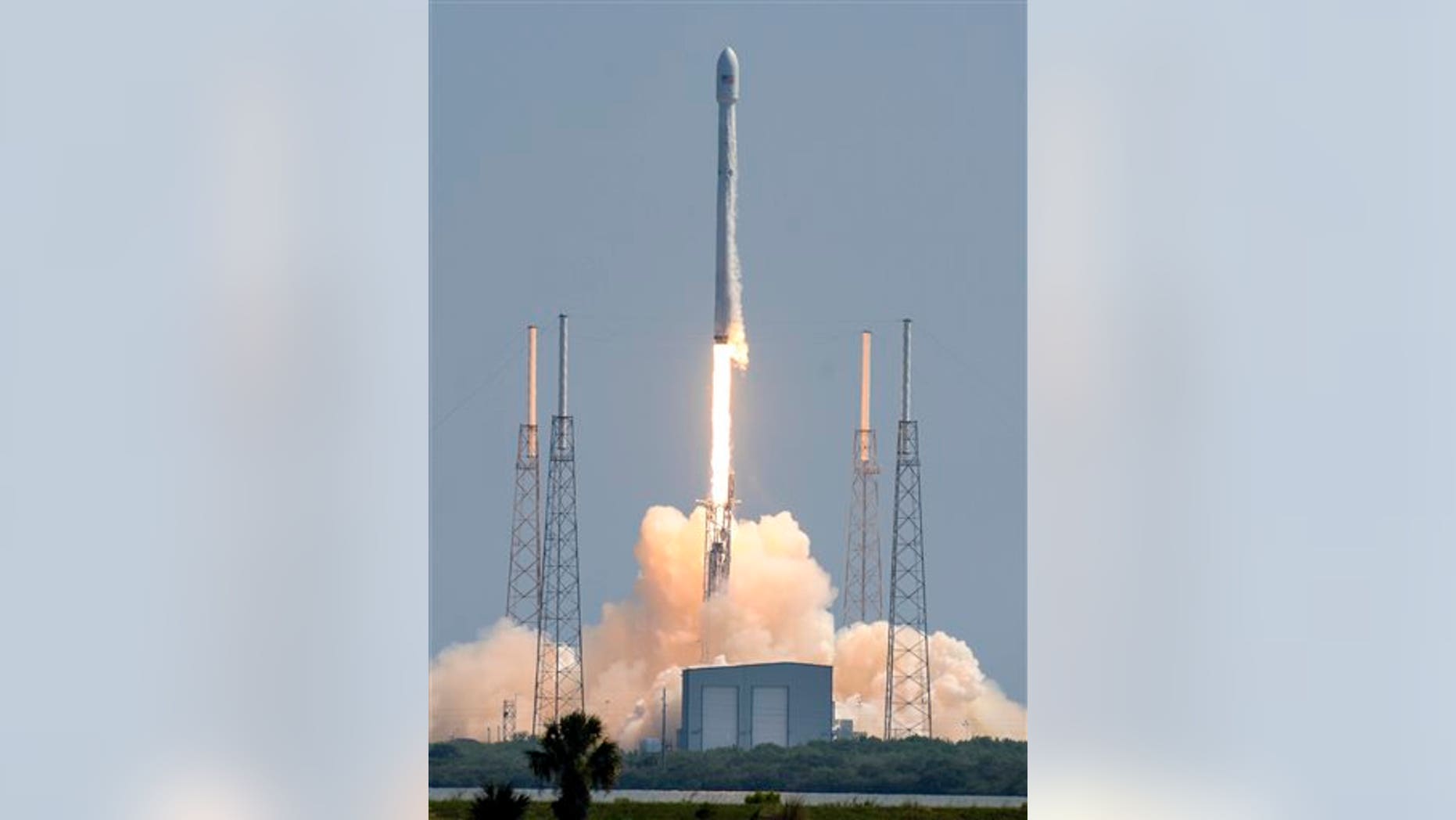 A SpaceX Falcon 9 rocket blasts off from Cape Canaveral Air Force Station Wednesday morning, June 15, 2016, carrying a pair of commercial communications satellites. (Craig Bailey/Florida Today via AP)