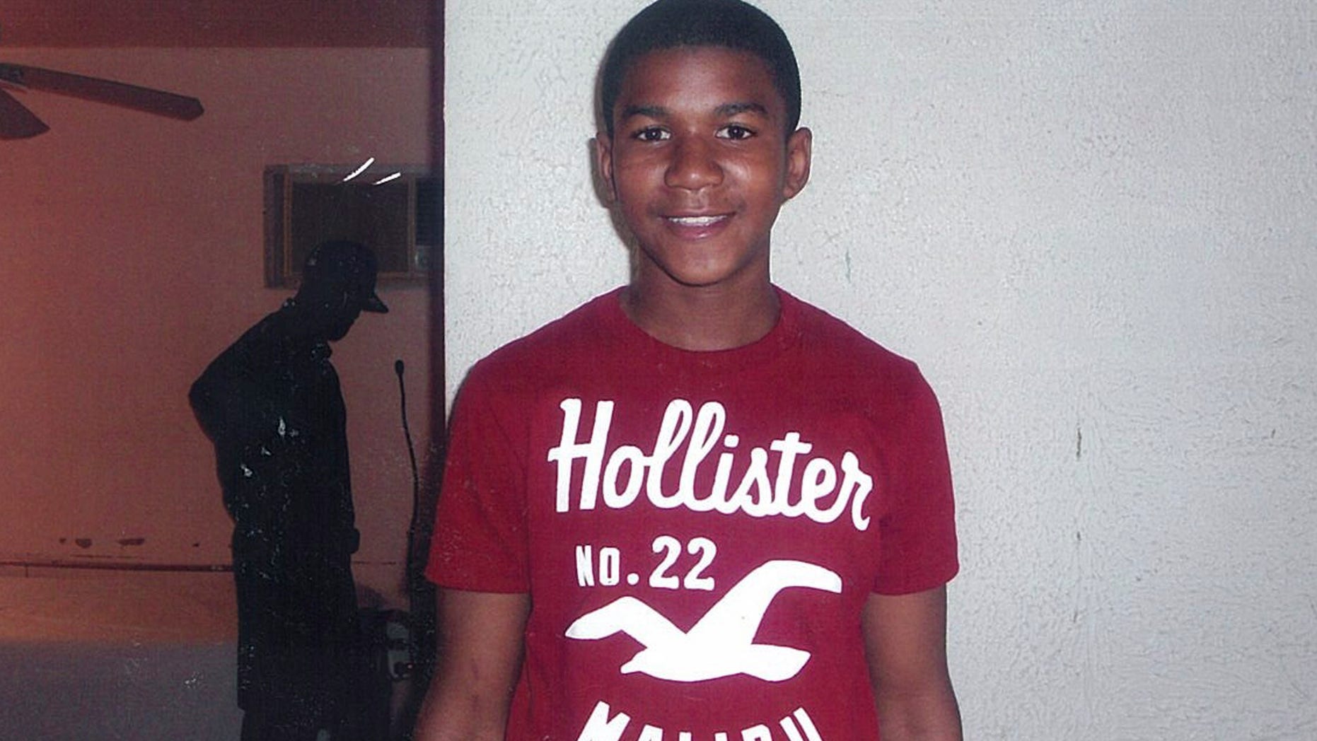 In this undated file family photo, Trayvon Martin poses for a family photo.