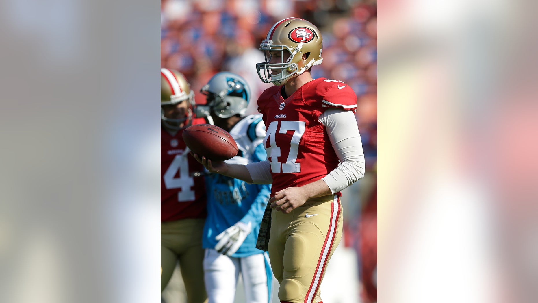 FILE - In this Nov. 10, 2013, file photo, San Francisco 49ers long snapper Kevin McDermott warms up before an NFL football game against the Carolina Panthers in San Francisco. McDermott become a snapper when the coach of his middle school team in Nashville, Tenn. asked everybody to line up and give snapping a try. After being an undrafted free agent in April, McDermott got his shot when he signed with the 49ers and in a few months, become the starter. (AP Photo/Marcio Jose Sanchez, File)