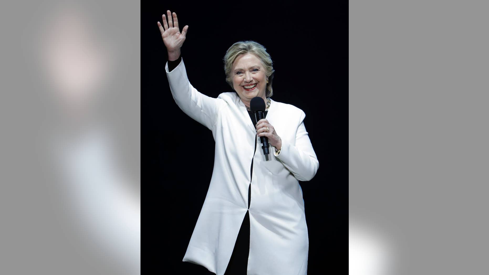 Democratic presidential candidate Hillary Clinton speaks during a concert hosted by musician Katy Perry, Saturday, Nov. 5, 2016, at the Mann Center for the Performing Arts in Philadelphia. (AP Photo/Julio Cortez)
