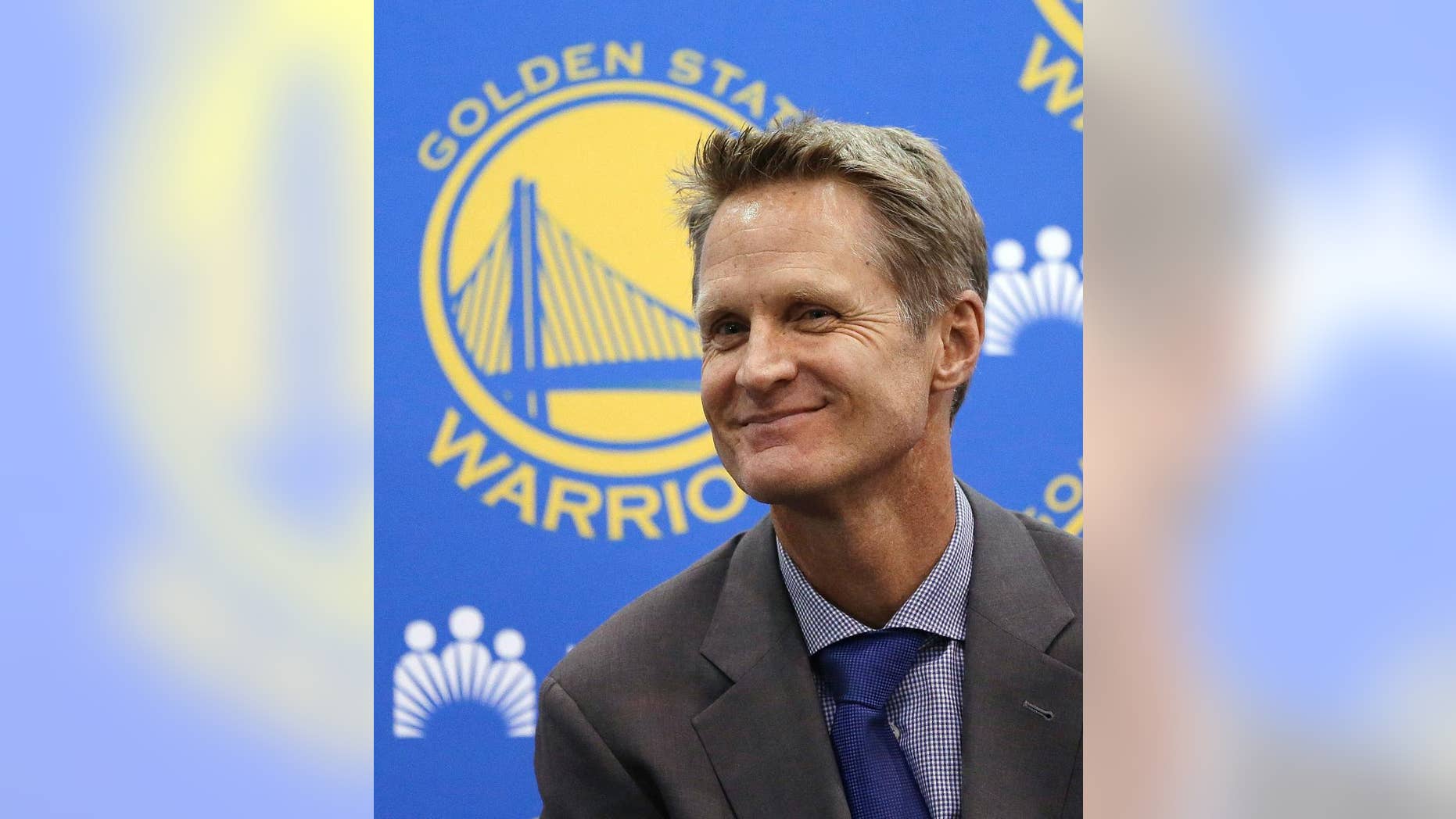 File - In this May 20, 2014, file photo, Golden State Warriors coach Steve Kerr smiles during a news conference in Oakland, Calif. With the Warriors set to open training camp Tuesday, Sept. 30, Kerr is counting on his work this offseason to pay off in practice. He has traveled the globe since being hired to replace coach Mark Jackson in May, believing all along that building personal relationships with players would wash away any uneasiness some had from his popular predecessor’s firing. (AP Photo/Ben Margot, File)