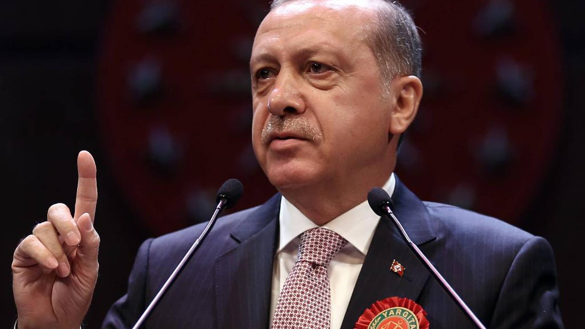 Turkey's President Recep Tayyip Erdogan addresses a gathering of judges and lawyers at his palace in Ankara, Turkey, Thursday, Sept. 1, 2016. (Yasin Bulbul, Presidential Press Service, Pool via AP)