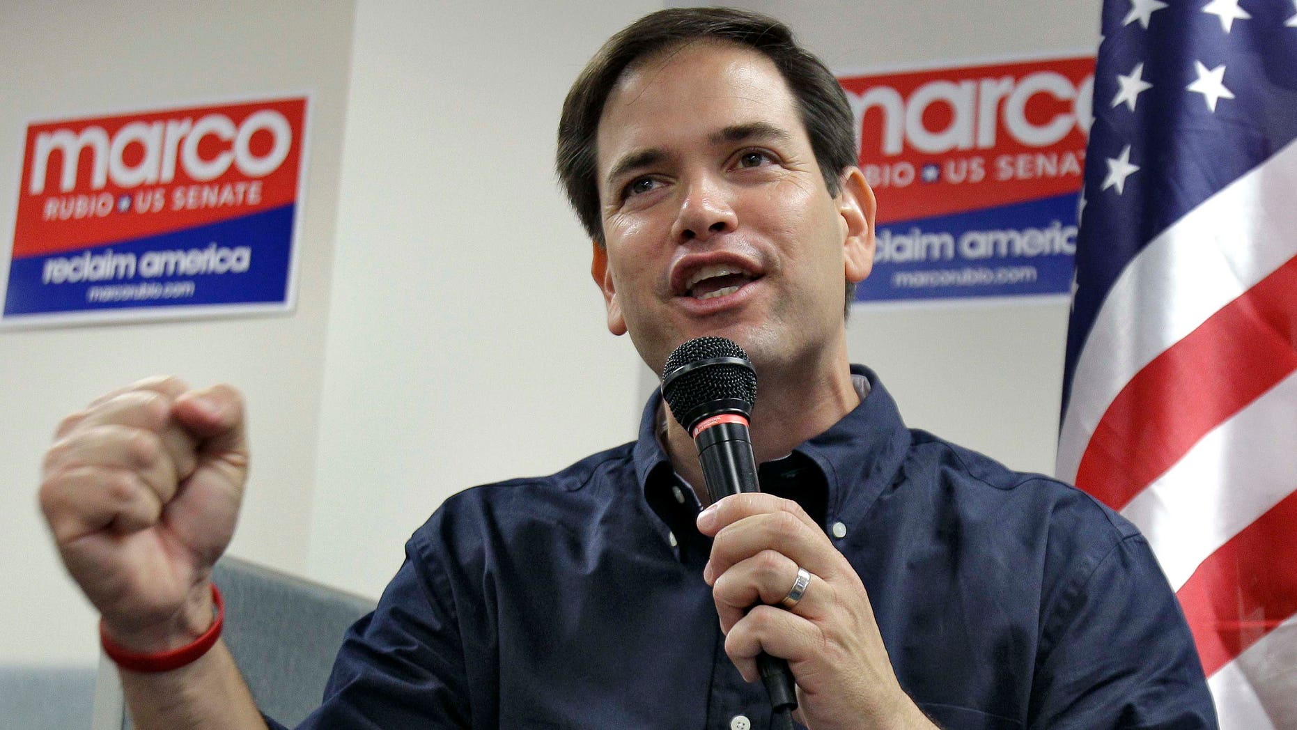 Republican candidate for the U.S. Senate, Marco Rubio, pumps his fist as he finishes speaking to supporters during a campaign stop Saturday, Oct. 30, 2010, in Lakeland, Fla. (AP Photo/Chris O'Meara)