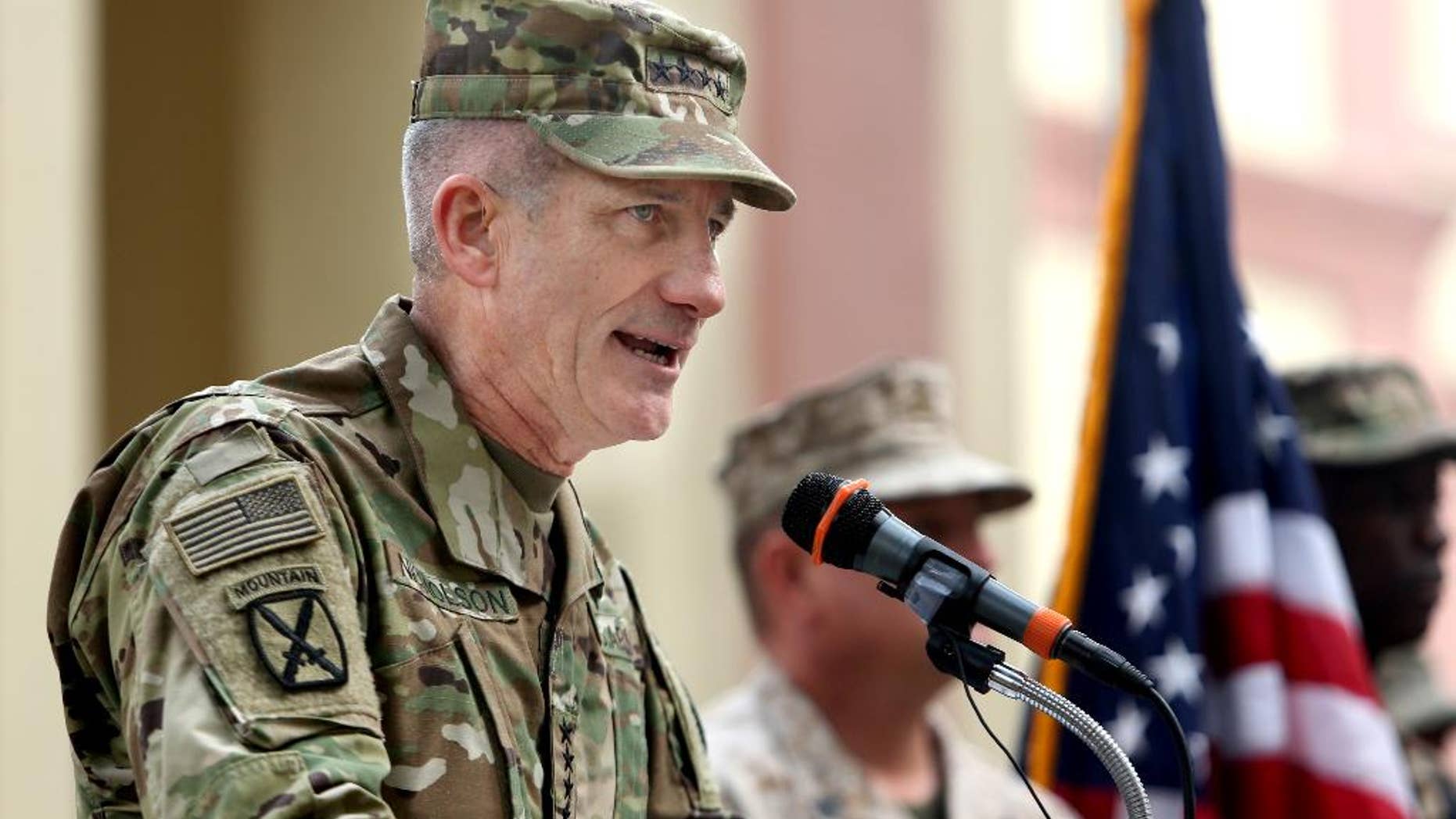 FILE - In this Wednesday, March 2, 2016 file photo, new U.S. commander in Afghanistan, U.S. Army Gen. John Nicholson speaks during a change of command ceremony at the Resolute Support Headquarters in Kabul, Afghanistan. President Barack Obama's decision to allow more aggressive U.S. military action in support of Afghan combat operations against the Taliban could have a game-changing effect on the long war, Gen. John Nicholson, the top U.S. commander in Afghanistan, said Saturday, July 16, 2016. (AP Photo/Rahmat Gul, File)