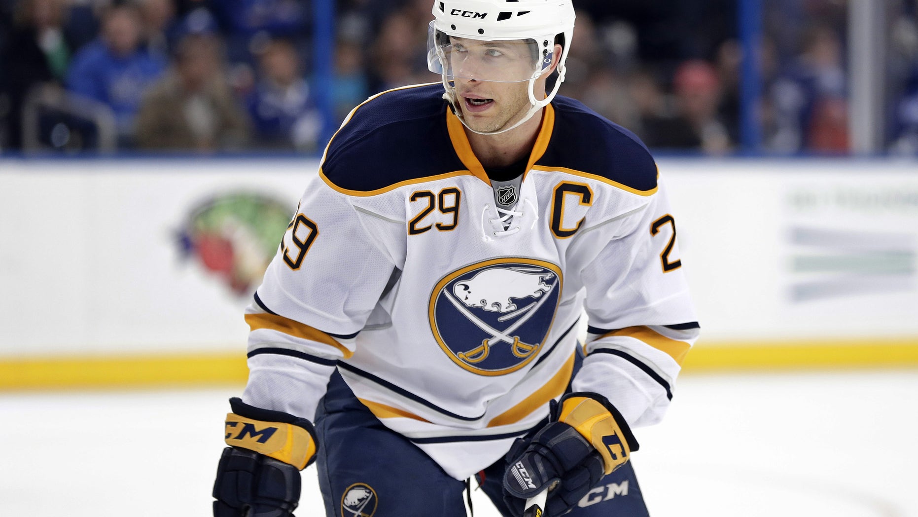 FILE - In this March 26, 2013, file photo, Buffalo Sabres right wing Jason Pominville skates against the Tampa Bay Lightning during the first period of an NHL Hockey game in Tampa, Fla. A person familiar with trade talks has confirmed the Sabres have agreed to deal their captain to the Minnesota Wild on Wednesday, April 3, 2013. The person spoke on the condition of anonymity because the trade has not yet been approved by the NHL. (AP Photo/Chris O'Meara, File)