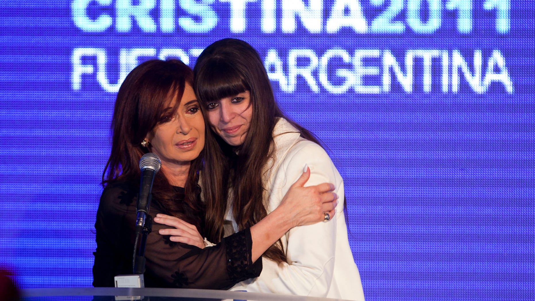 President Cristina Férnandez and her daughter Florencia the evening of her first round election victory on August 14, 2011. (AP foto/Victor R. Caivano)