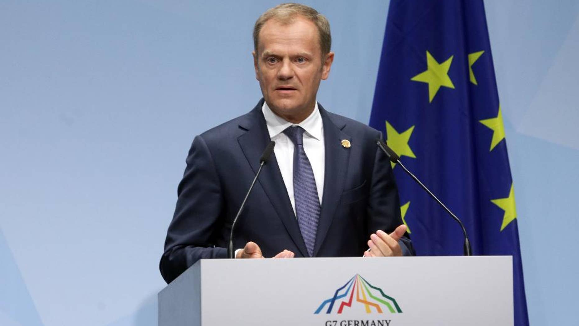 European Council President Donald Tusk speaks during a media conference at the G-7 summit at Schloss Elmau hotel near Garmisch-Partenkirchen, southern Germany, Sunday, June 7, 2015. The two-day summit will address such issues as climate change, poverty and the situation in Ukraine. (AP Photo/Virginia Mayo)