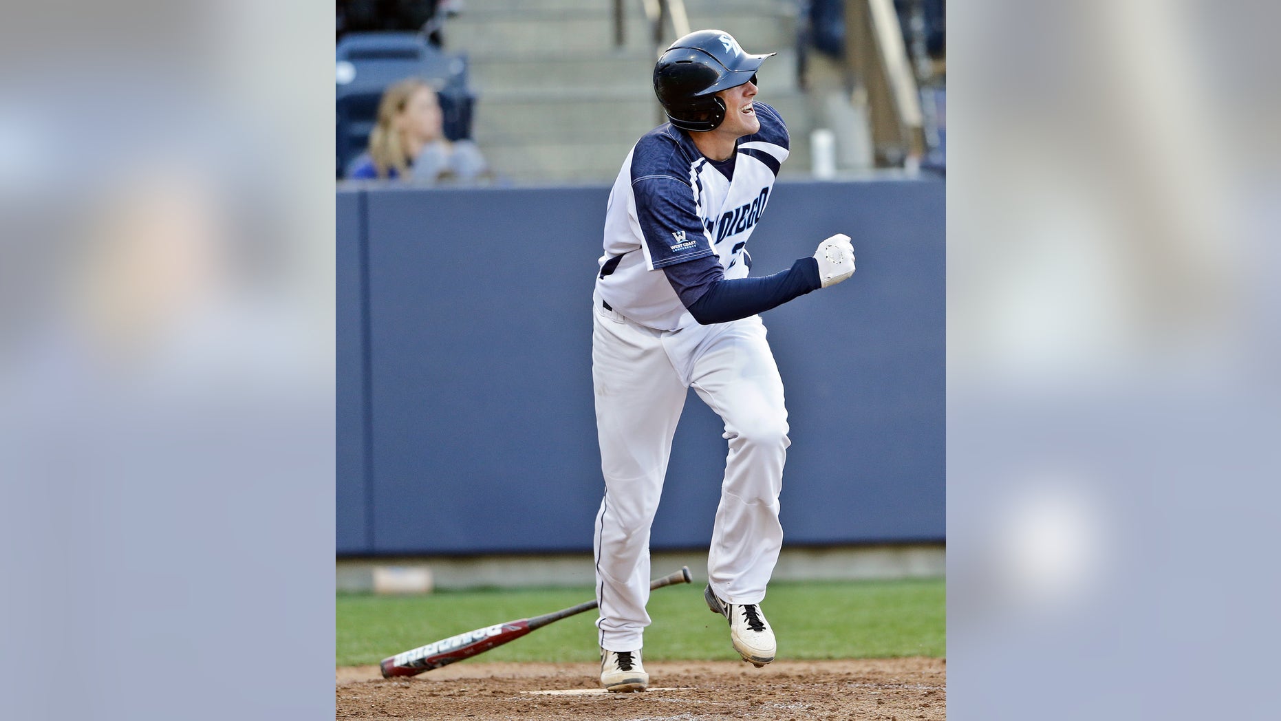 FILE - In this April 16, 2013, file photo, San Diego third baseman Kris Bryant watches one of his two home runs in a 7-5 victory against UC-Santa Barbara in a college baseball game in San Diego. With every prodigious drive over the fences, the University of San Diego star is adding to what could be considered the most prolific home-run hitting performance in NCAA history. (AP Photo/Lenny Ignelzi, File)
