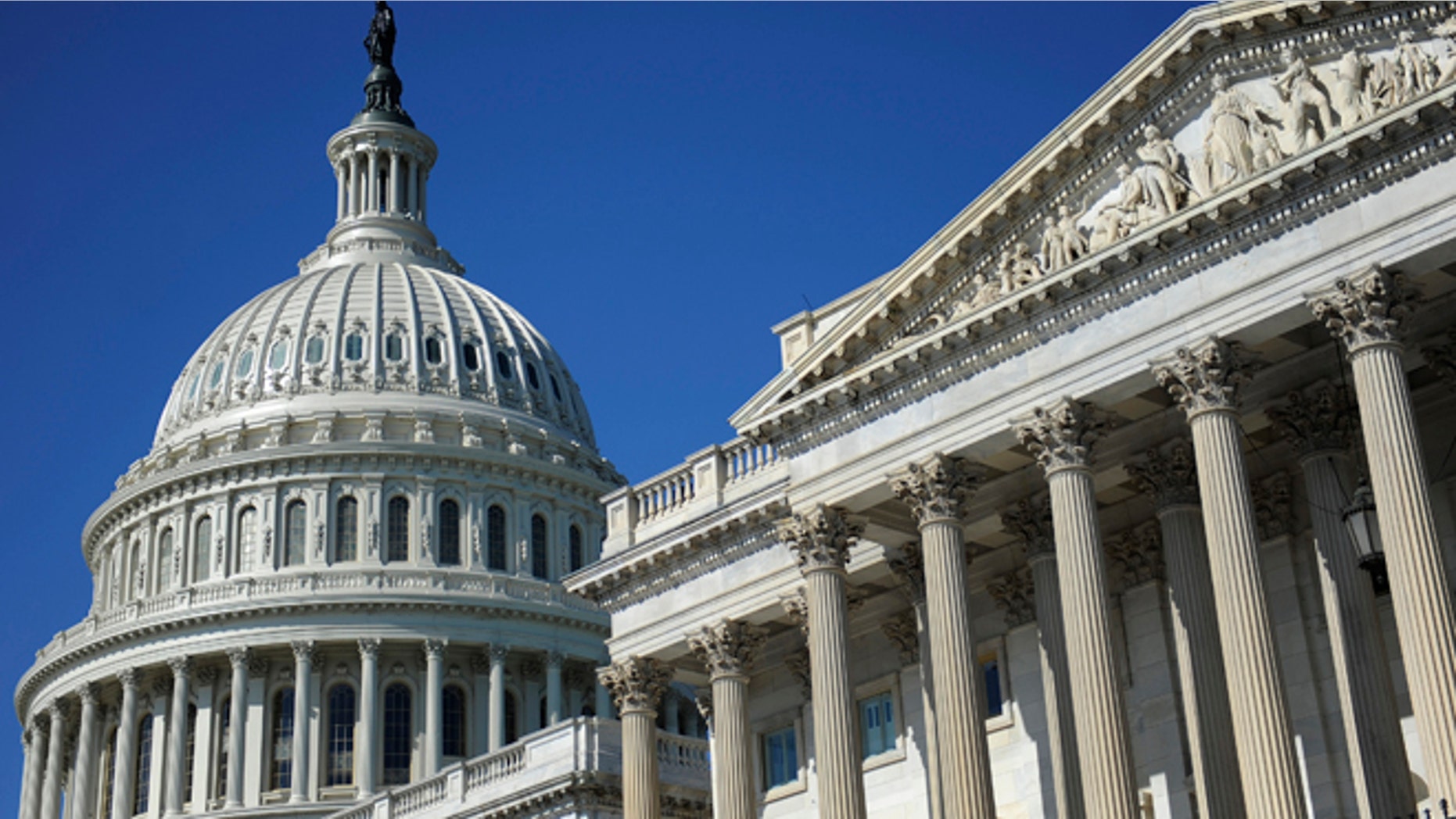 FILE -- August 2, 2011. The U.S. Capitol dome and U.S. Senate (R) in Washington. (Reuters)