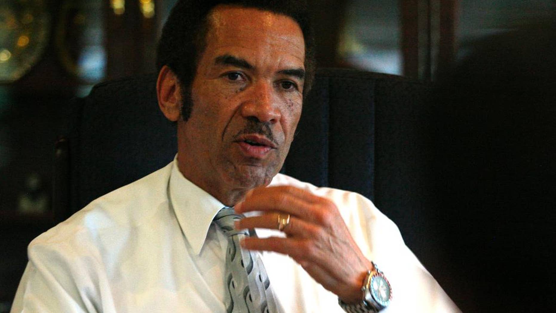 FILE - In this Friday April. 30, 2010 file photo Botswana President Seretse Ian Khama speaks during an interview with The Associated Press at his office in Gaborone, Botswana. The July 30, 2014, death, in a road accident, of opposition leader Gomolemo Motswaleda, has highlighted brewing tension in Botswana, with the opposition alleging that Motswaledi may have been assassinated by pro-government agents although evidence is lacking. Motswaledi was once an ally of President Ian Khama but fell out with him and formed the Botswana Movement for Democracy in 2010 to challenge what he described as a concentration of power among presidential loyalists. (AP Photo/Themba Hadebe, File)