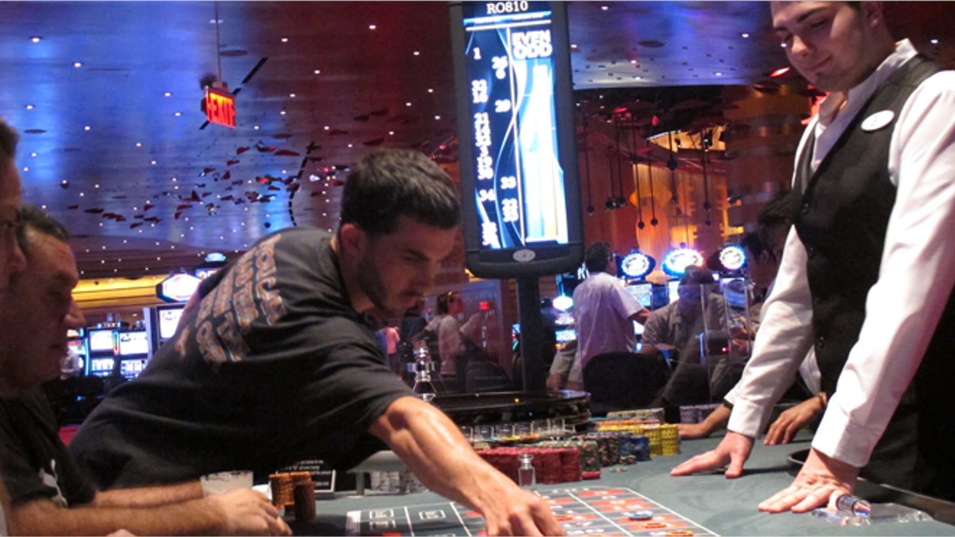 May 21, 2012: A dealer watches as gamblers place bets on a roulette table at Revel Casino Hotel in Atlantic City, N.J. Revel is one of three Atlantic City casinos that could close by September in a wave of casino contraction that could be a glimpse of the future for other parts of the country with too many casinos and not enough gamblers to support them. (AP/Wayne Parry)