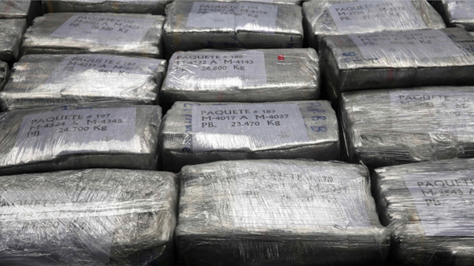 September 1, 2014: Blocks of seized cocaine are presented to the press at a police base in Lima, Peru. According to police, the packages are part of a 8.5 ton cocaine seizure made in the northern town of Trujillo on Aug. 26, and is the largest cocaine seizure in Peru's history. (AP Photo/Martin Mejia)