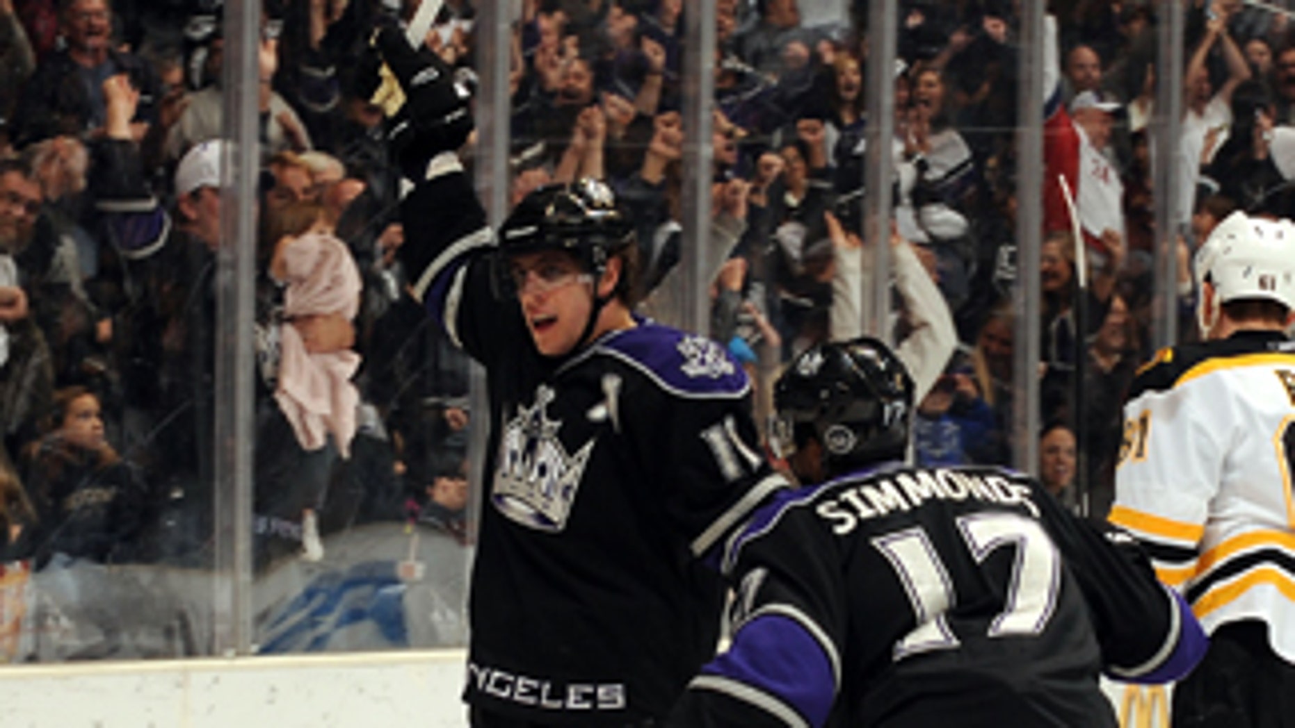 LOS ANGELES, CA - JANUARY 16: Anze Kopitar #11 of the Los Angeles Kings celebrates after scoring a goal against the Boston Bruins on January 16, 2010 at Staples Center in Los Angeles, California. (Photo by Noah Graham/NHLI via Getty Images) *** Local Caption *** Anze Kopitar