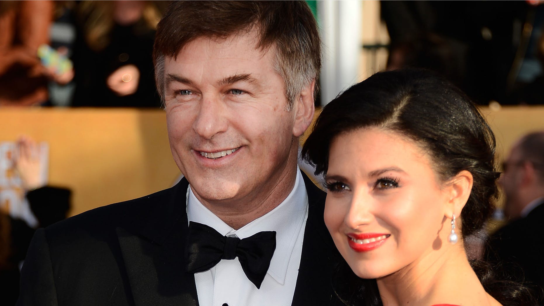 LOS ANGELES, CA - JANUARY 27: Actor Alec Baldwin and wife Hilaria Thomas arrive at the 19th Annual Screen Actors Guild Awards held at The Shrine Auditorium on January 27, 2013 in Los Angeles, California. (Photo by Frazer Harrison/Getty Images)