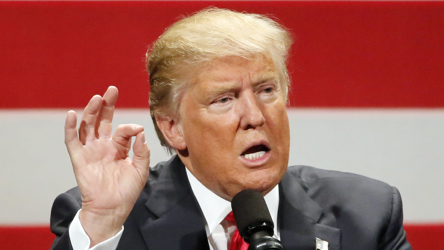 FILE - In this April 4, 2016 file photo, Republican presidential candidate Donald Trump speaks in Milwaukee. Fifty-five percent of Americans say they have a negative opinion of Democratic front-runner Hillary Clinton. But thatâs not nearly as bad as how they view the leading candidate for the Republican nomination, Donald Trump. (AP Photo/Charles Rex Arbogast)