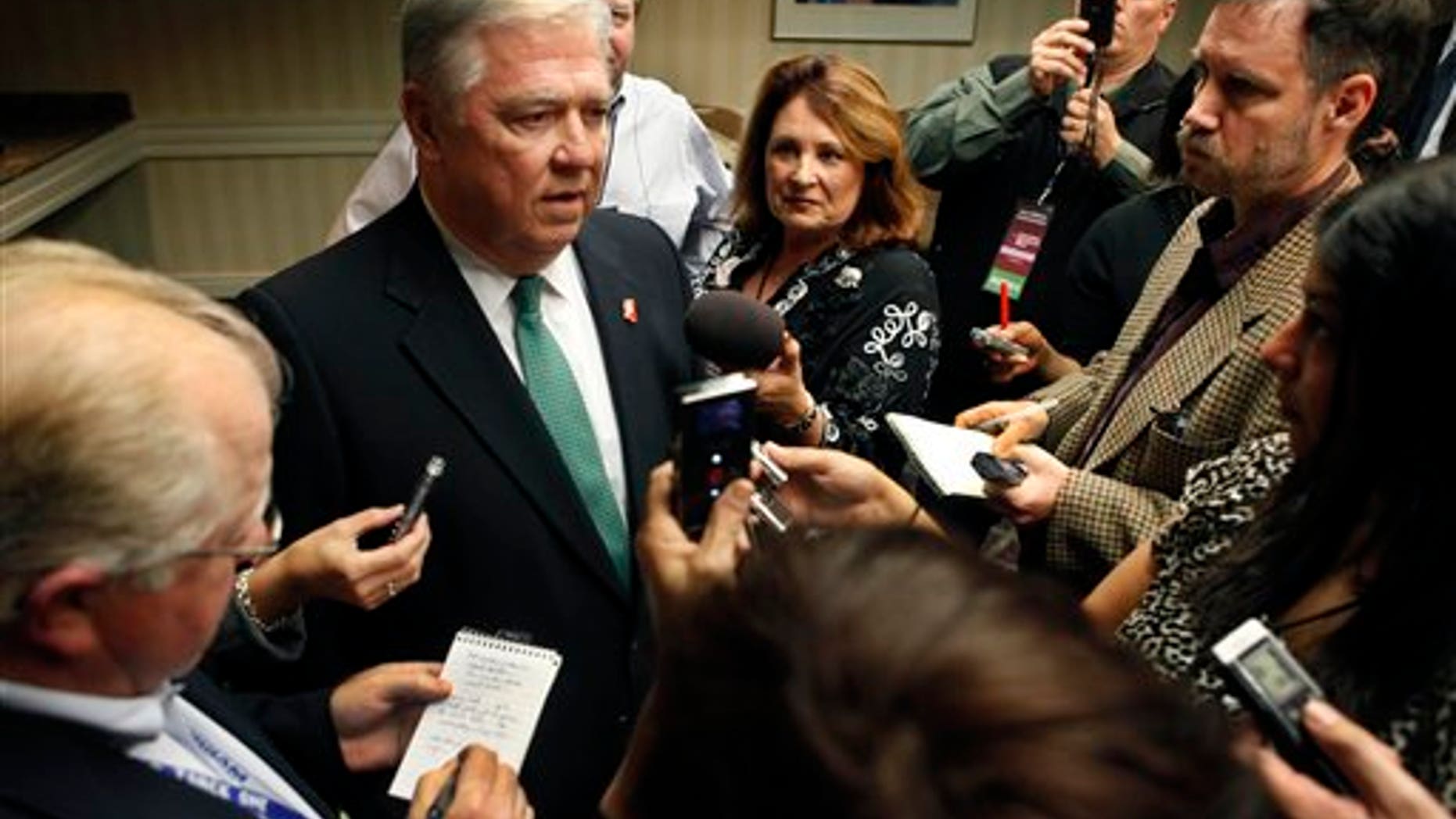 Barbour talks with reporters during the California Republican Convention in Sacramento, Calif., Saturday. (AP)