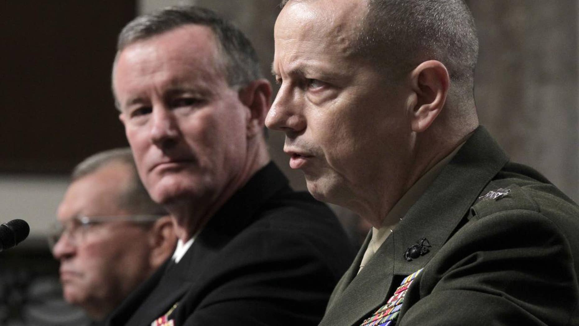 Marine Lt. Gen. John Allen, President Obama's choice to lead the military in Afghanistan, right, testifies on Capitol Hill in Washington, Tuesday, June 28, 2011, before the Senate Armed Services Committee hearing on his nomination. (AP Photo/J. Scott Applewhite)