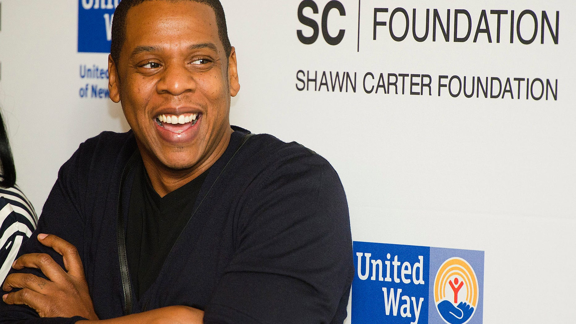 Shawn "Jay Z" Carter attends a press event to announce his Carnegie Hall performances to benefit the United Way and the Shawn Carter Scholarship Foundation, in New York, Thursday, Dec. 8, 2011. (AP Photo/Charles Sykes)