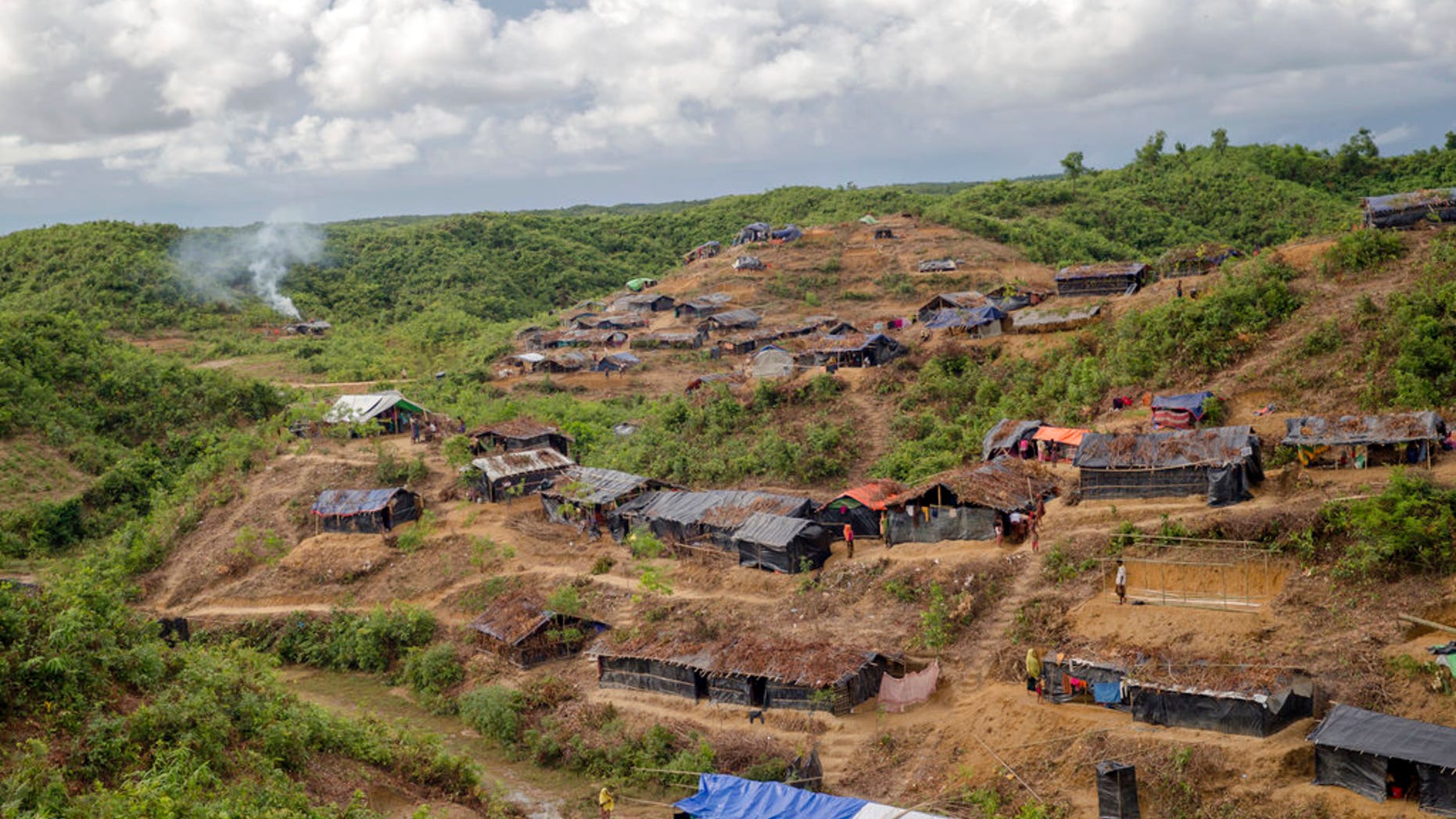 Tents cover a hillock at a refugee camp for Rohingya Muslims who crossed over from Myanmar into Bangladesh, in Taiy Khali, Bangladesh, Wednesday, Sept. 27, 2017.