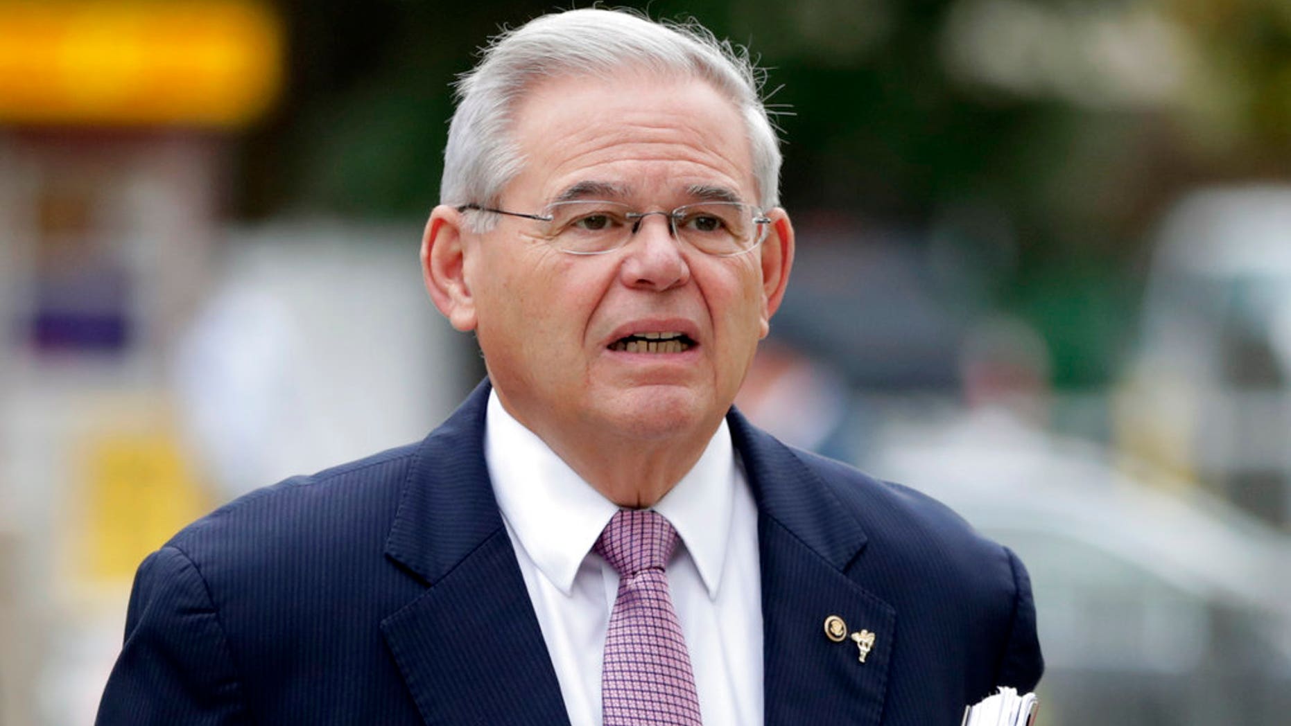 U.S. Sen. Bob Menendez arrives at the Martin Luther King, Jr., Federal Courthouse for his federal corruption trial, Thursday, Oct. 26, 2017, in Newark, N.J. (AP Photo/Julio Cortez)