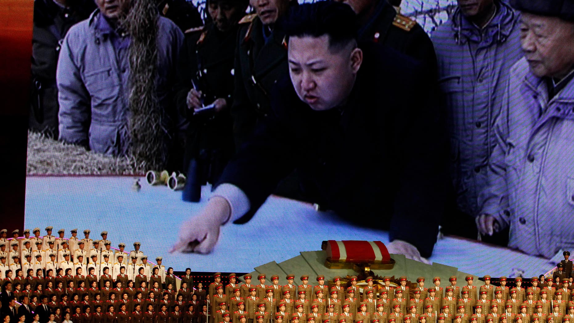 April 24, 2012: North Korea's new commander in chief, Kim Jong Un, is displayed on a giant screen during a concert on the eve of the 80th anniversary of the founding of the North Korean army in Pyongyang, North Korea. (AP/Ng Han Gua, File)