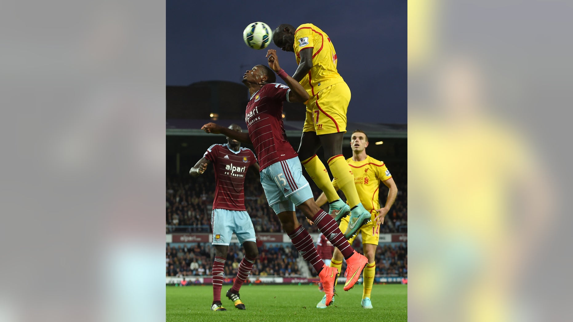 West Ham Uniteds Diafra Sakho, left, competes for the ball with Liverpools Mamadou Sakho during their English Premier League soccer match at Upton Park, London, Saturday, Sept. 20, 2014. (AP Photo/Tim Ireland)