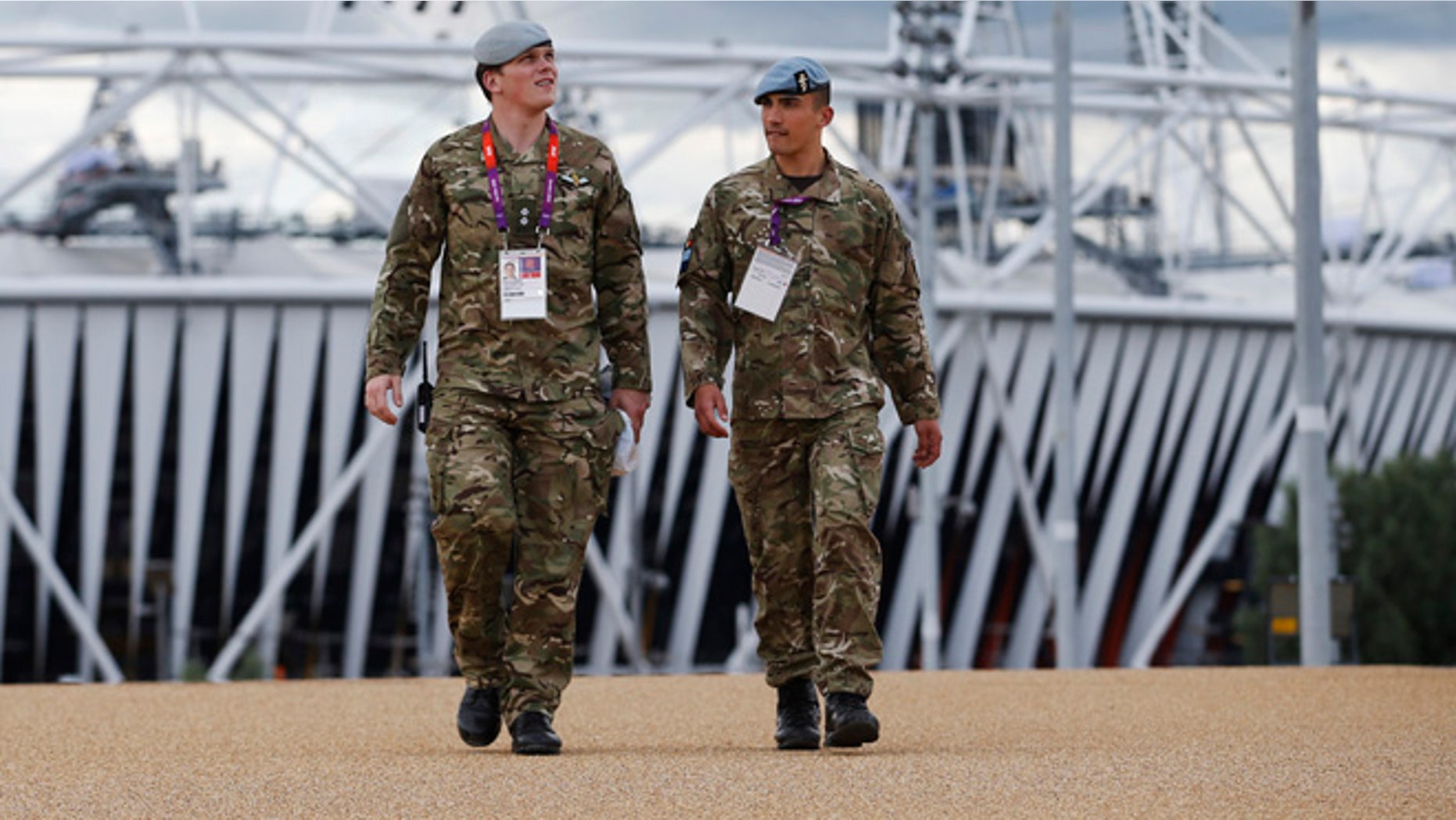 July 15, 2012: British military personnel walk away from the Olympic Stadium as preparations continue for the 2012 Summer Olympics in London.