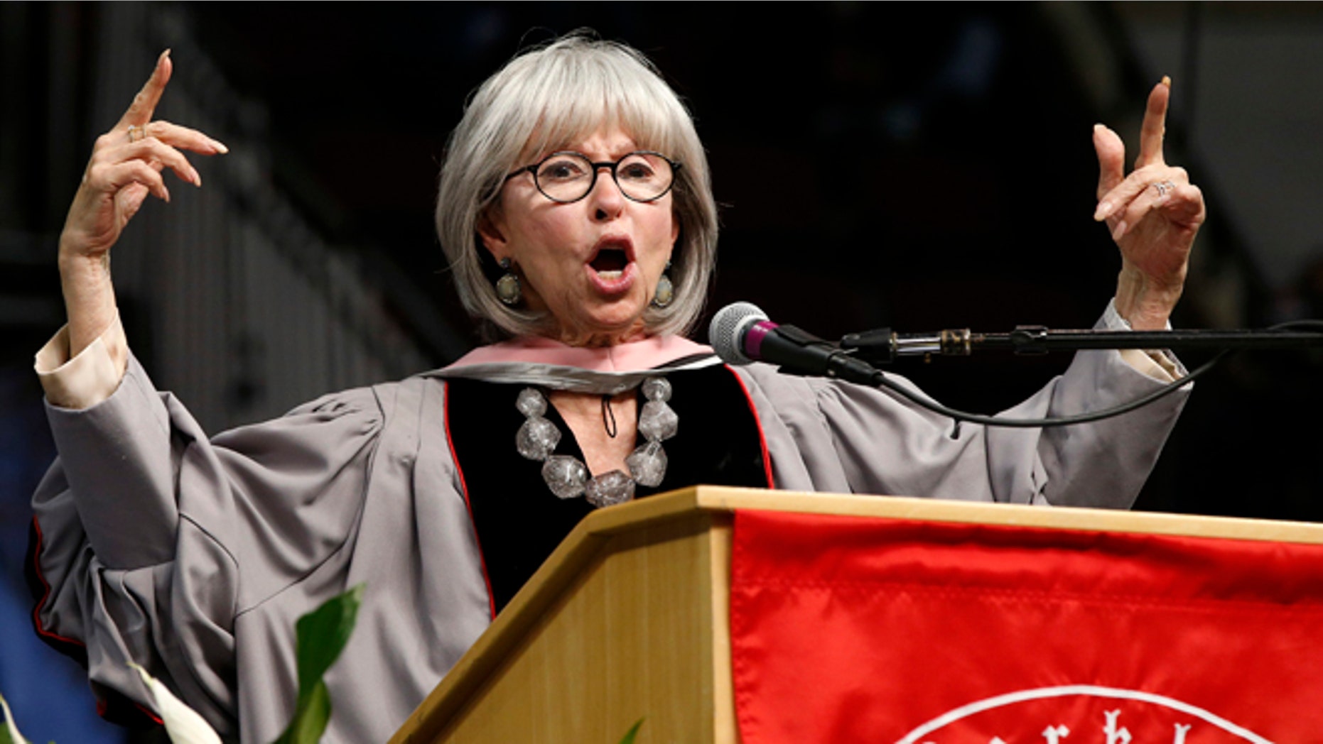 Rita Moreno raps her commencement address during Berklee College of Music commencement ceremonies in Boston, Saturday, May 7, 2016. (AP Photo/Michael Dwyer)