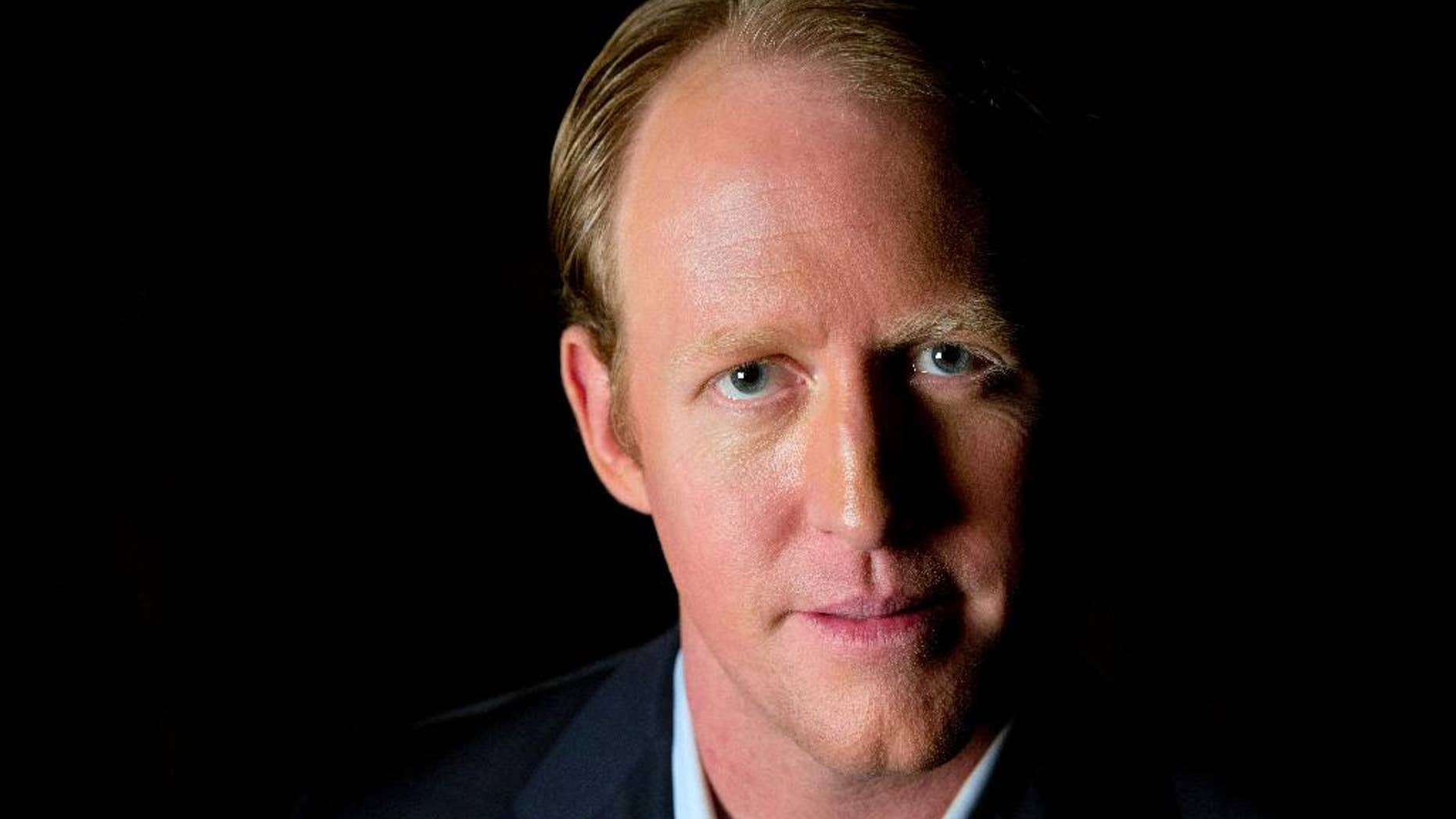 Retired Navy SEAL Robert O'Neill, 38, who says he shot and killed Osama bin Laden, poses for a portrait in Washington, Friday, Nov. 14, 2014. The former Navy SEAL says he was inspired to go public about his role after meeting with the families of people who died in the attacks of Sept. 11, 2001. (AP Photo/Jacquelyn Martin)